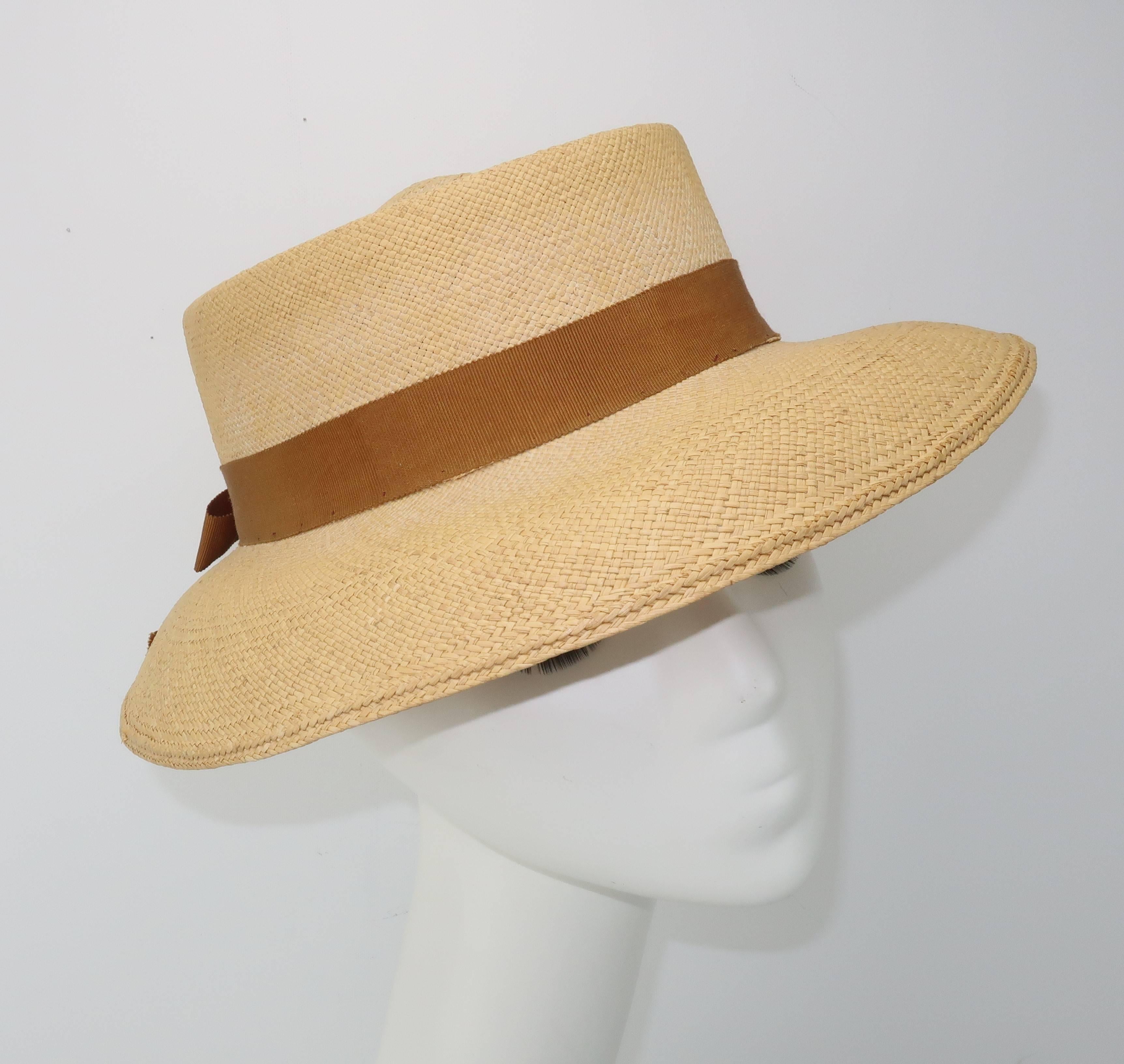 The ‘Panama’ hat has been worn and admired since the 1800’s for its functional and effortless style especially in warm weather climates often paired with summer linens.  This ladies 'Panaire' design was produced by the American hat company, Knox,