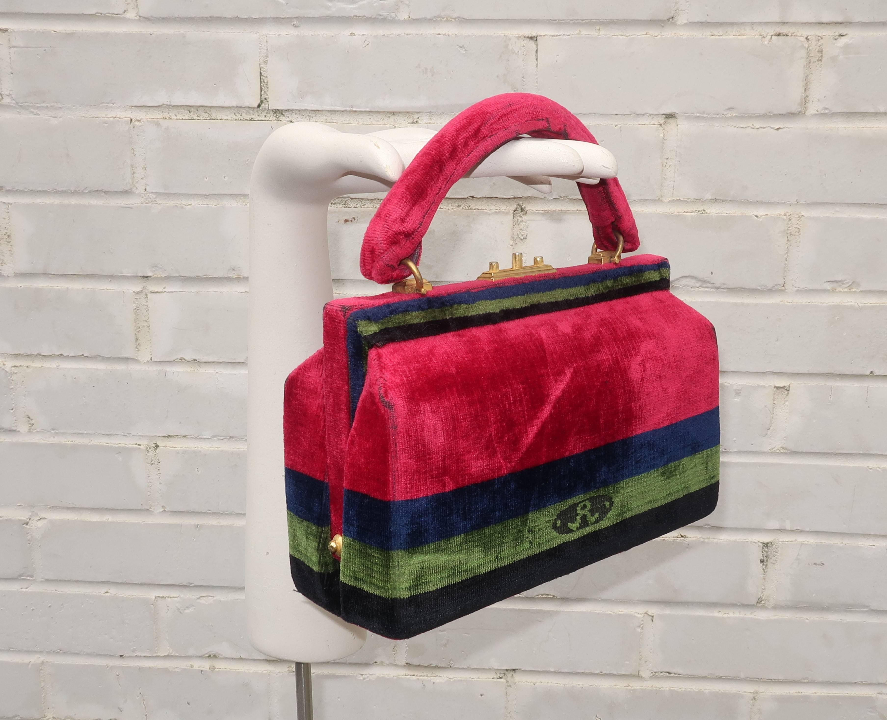 Giuliana Camerino's designs for her label Roberta Di Camerino are precious baubles and the perfect fashion accessory ... each one is like a tactile treasure.  This C.1960 handbag has a petite carpetbag sensibility in a wonderful banded pattern