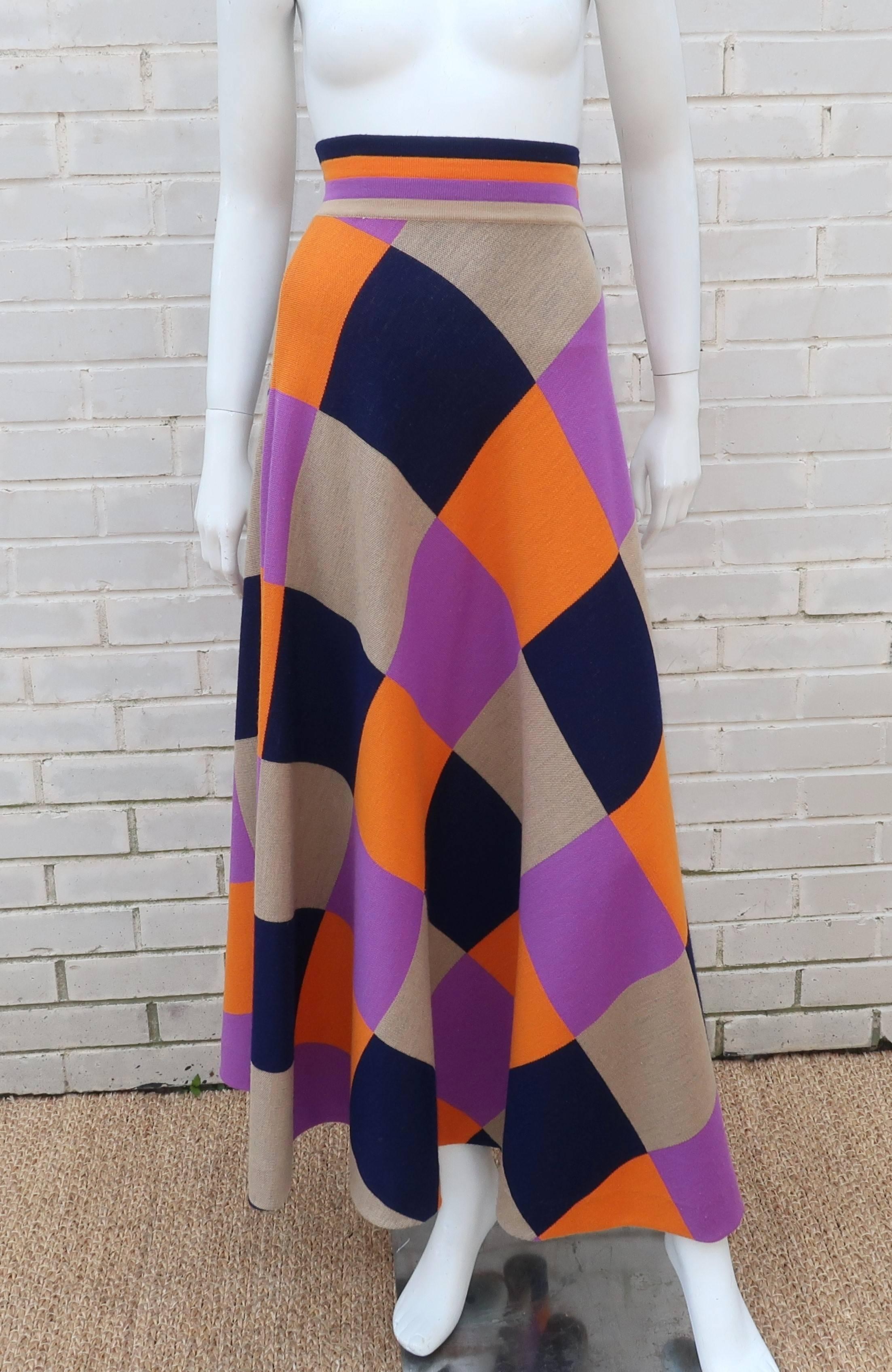 Magnificent maxi!  This 1970’s wool knit maxi skirt features a 3