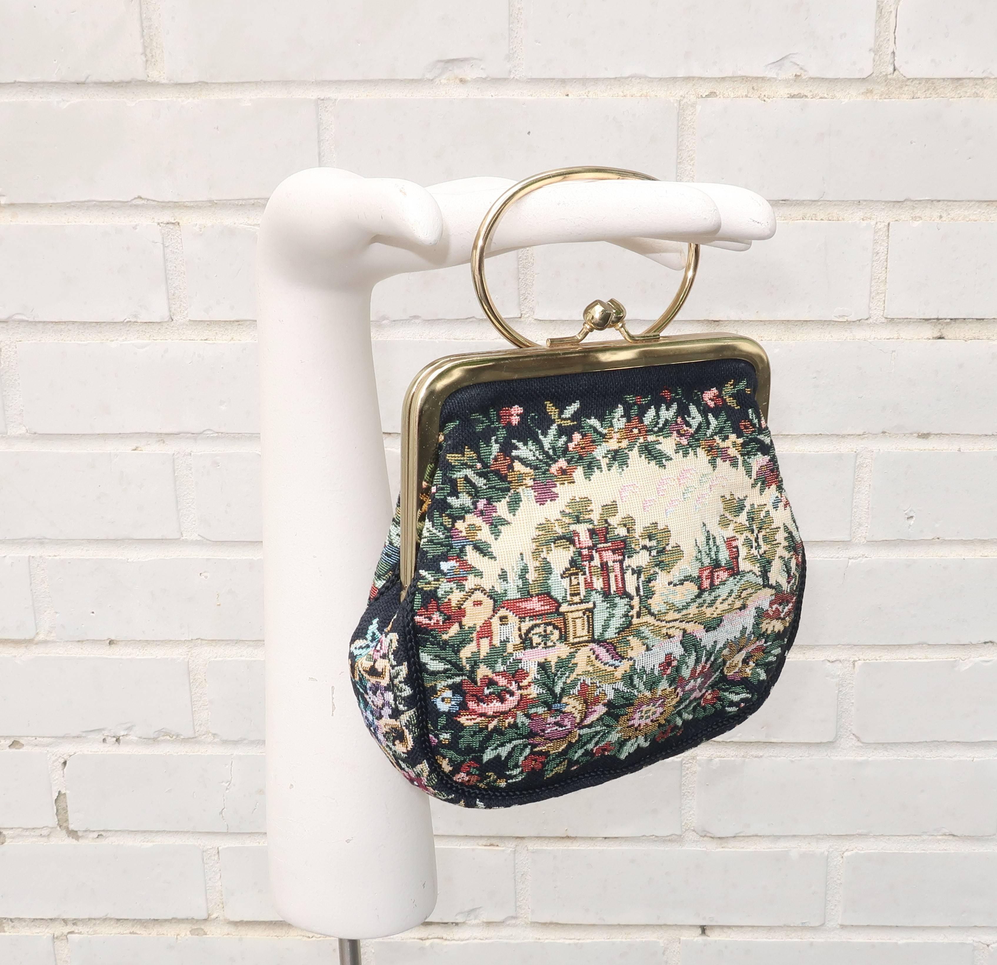  Hilde Walborg founded her company in the 1940's and produced classically styled handbags that offered a little something different for a special occasion.  This charming tapestry bag features a vibrant bucolic scene incorporating shades of beige,