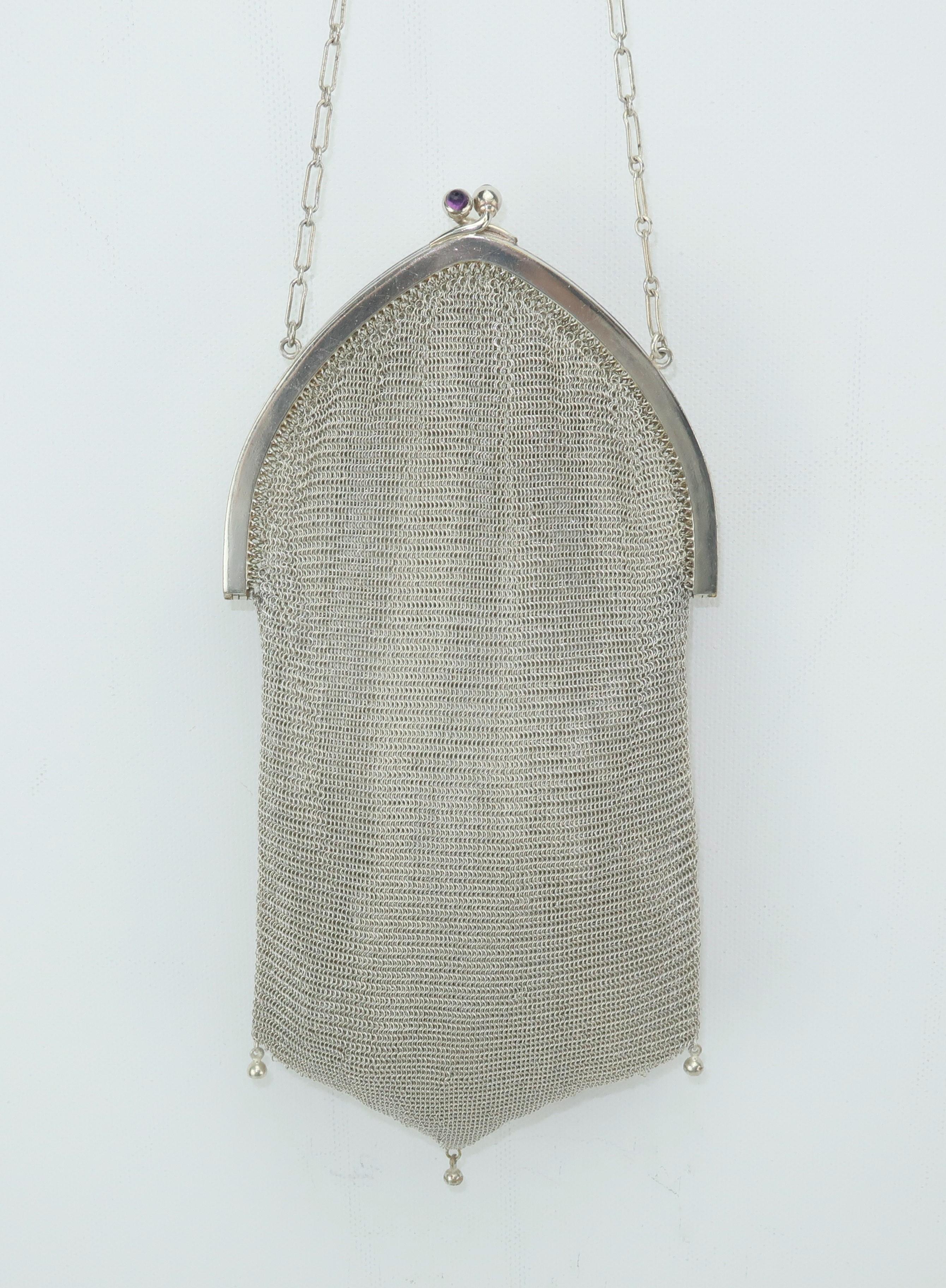 Whiting & Davis has been producing fashionable handbags since the late 1800’s and perfected mesh designs in the 1900's that originally were hand formed.  This 1920's version is similar in style to the early Whiting & Davis handbags with the