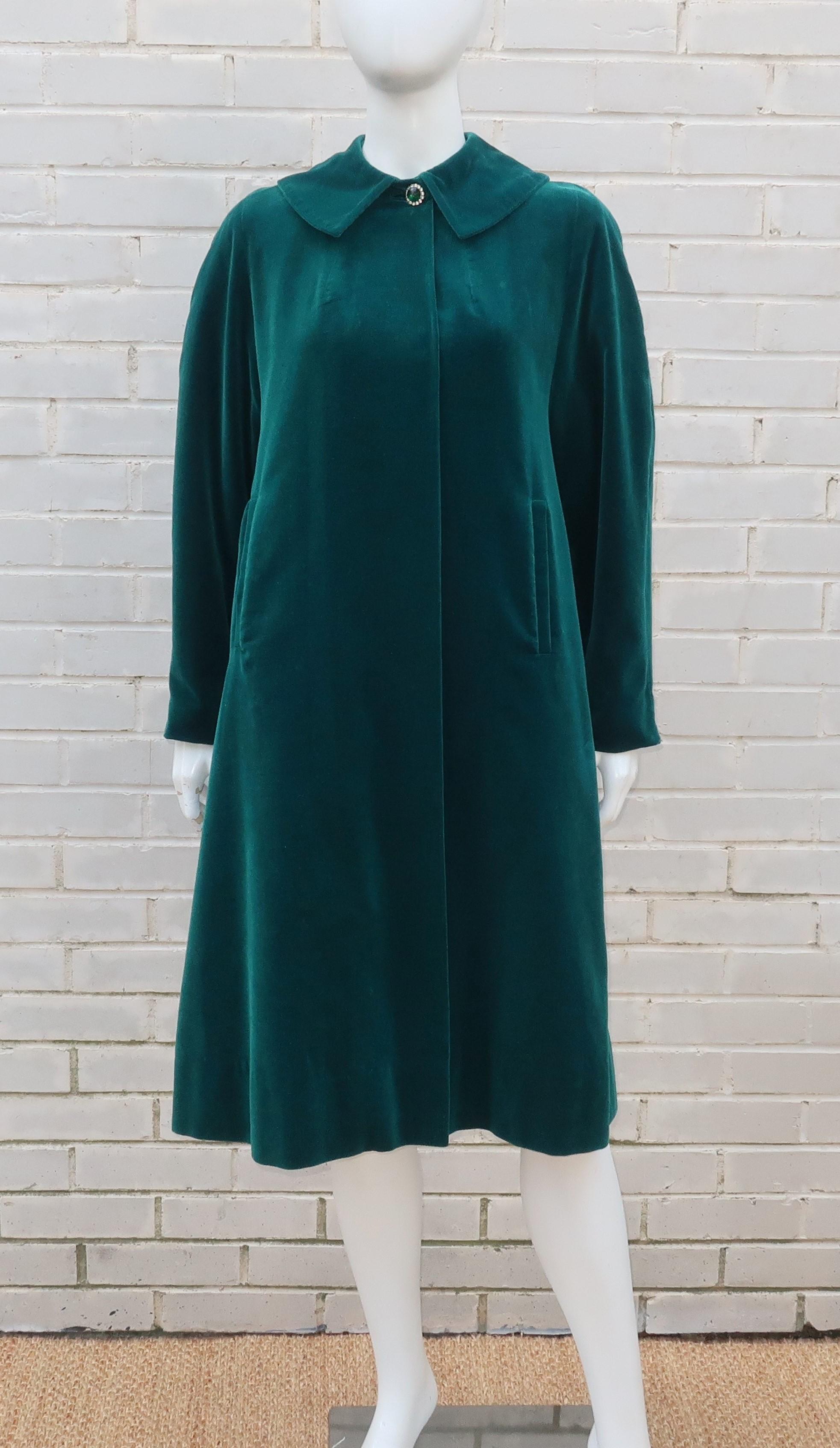 In the 1950’s, this emerald green (with the slightest hint of blue) velvet coat would have been a warm accessory to evening wear but fast forward to a modern wardrobe and picture pairing it with tweeds and woolens for a lush touch.  The Italian