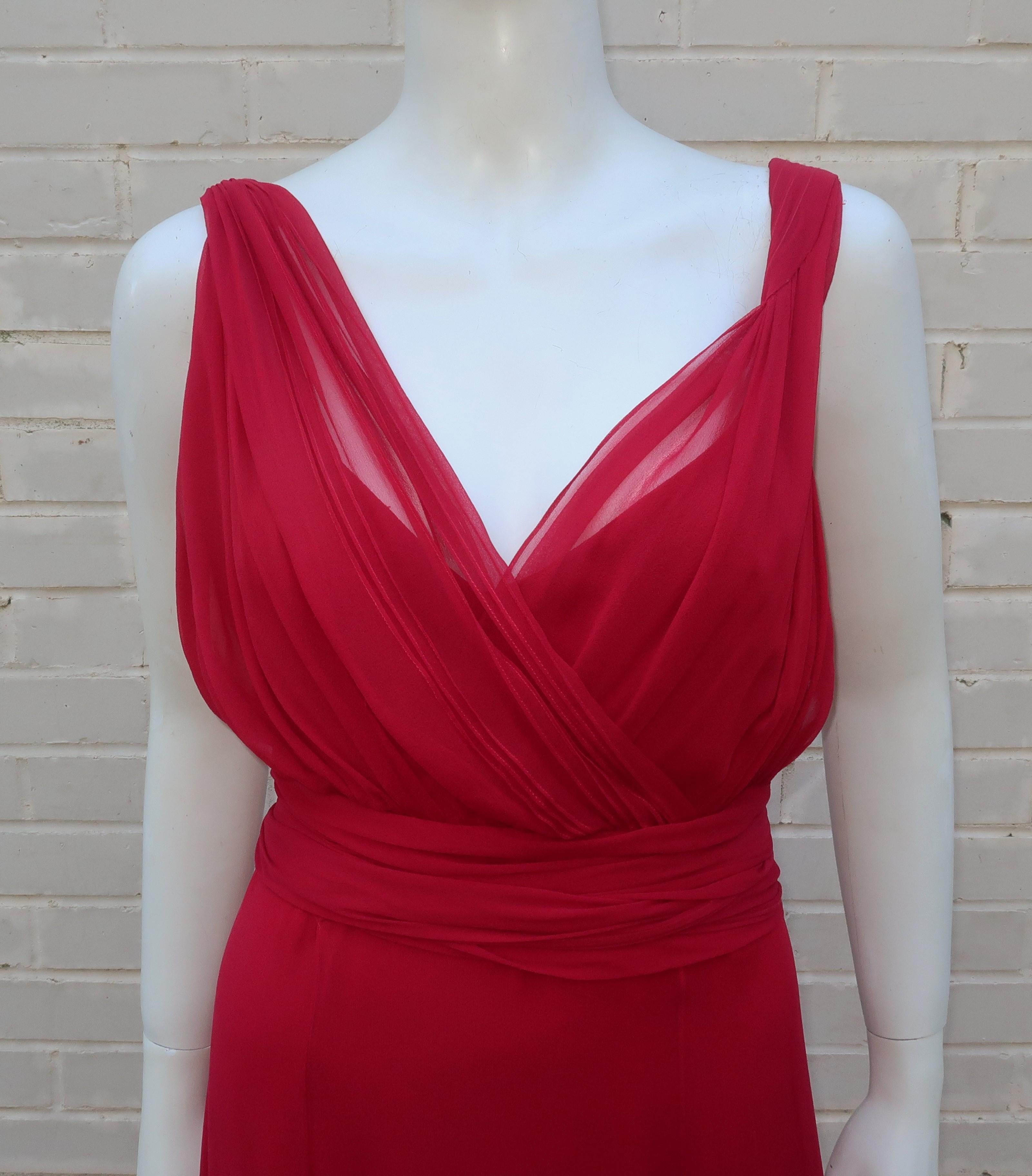 This Monique Lhuillier dress is a gorgeous goddess silhouette fabricated from three layers of dark cherry red silk chiffon.  The expert draping creates an ethereal look and is reminiscent of the Grecian designs by Madame Gres and Jean Desses from