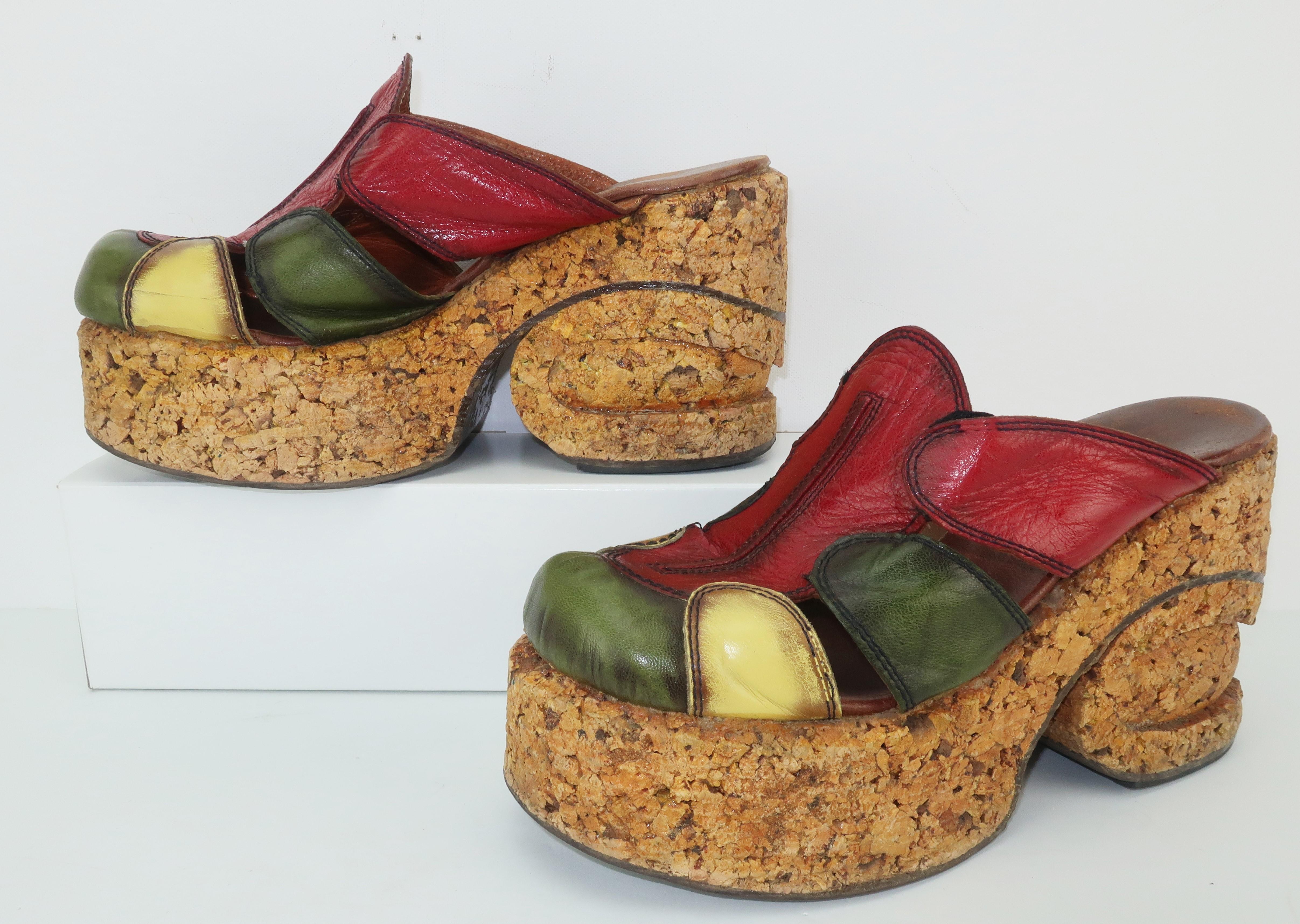 Dazed and Confused ... Boogie Nights ... Soul Train!  Get all funky and fabulous with these 1970’s Haviv chunky leather platform shoes.  The clog style silhouette features a patchwork of leather in shades of red, green and buttery yellow with a
