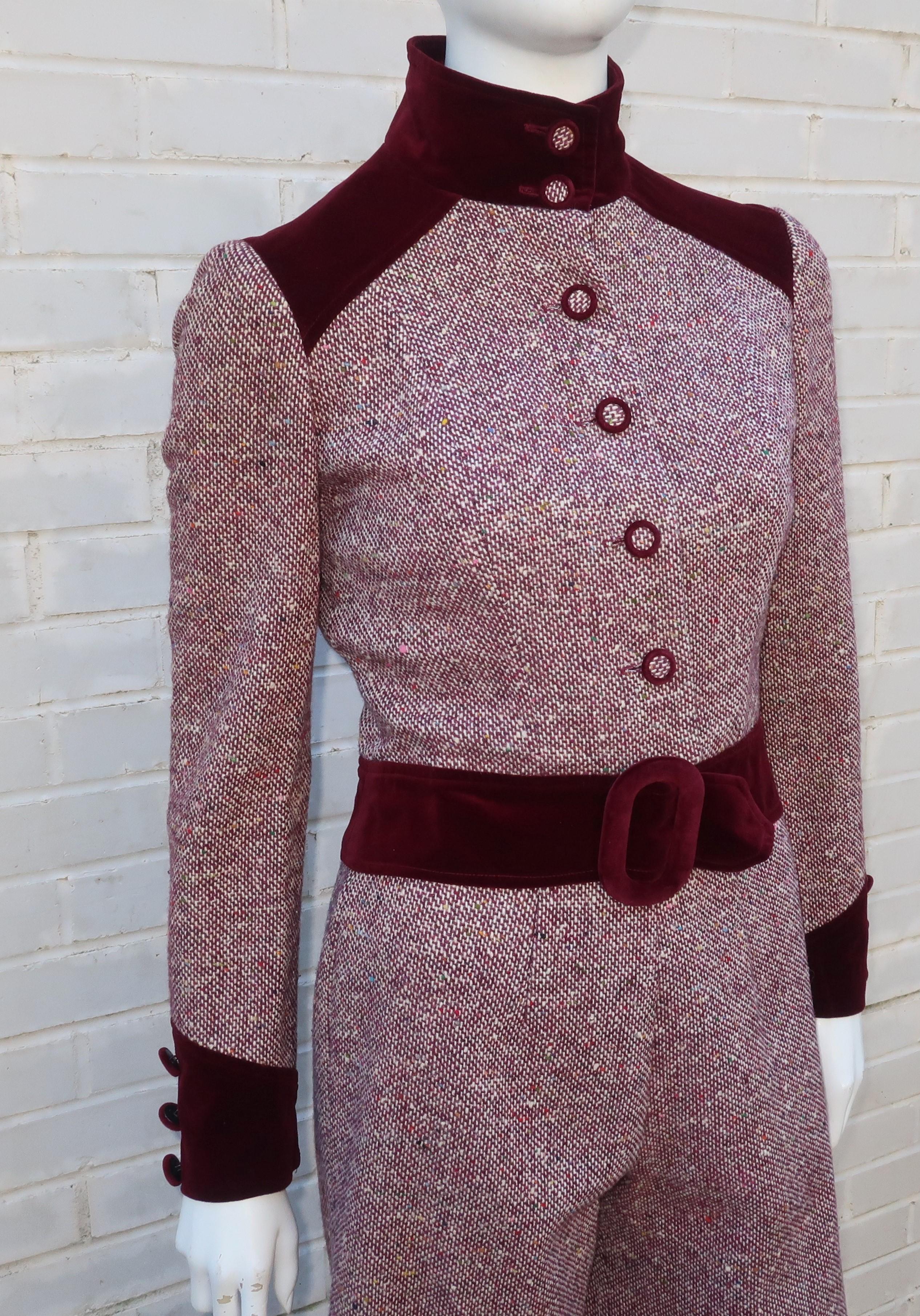 An adorable C.1970 mod pantsuit from California company, Arpeja, for their Young Victorian line designed with a trendy youthful appeal.  The two piece suit consists of a form fitting short jacket with self belt and high waist cropped gaucho style