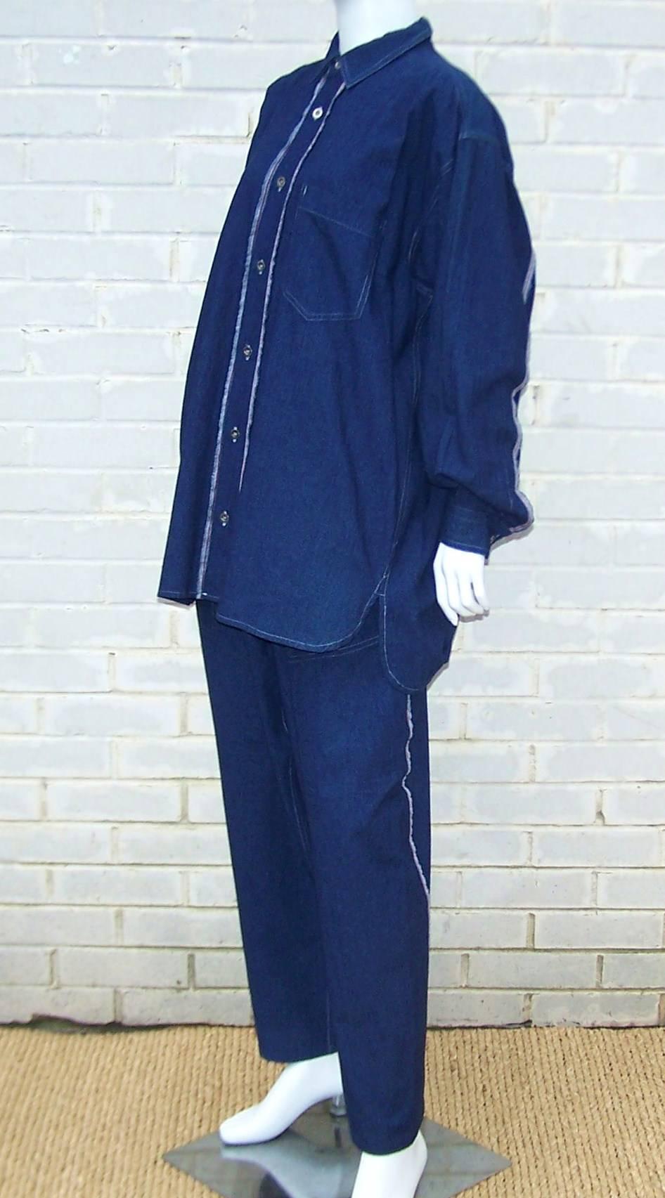 This light weight cotton denim 2-piece ensemble by Issey Miyake for his Plantation line is reminiscent of antique Japanese farmer's clothing.  The top has metal buttons with a breast pocket and the pull-on pants have an elasticized waistband with