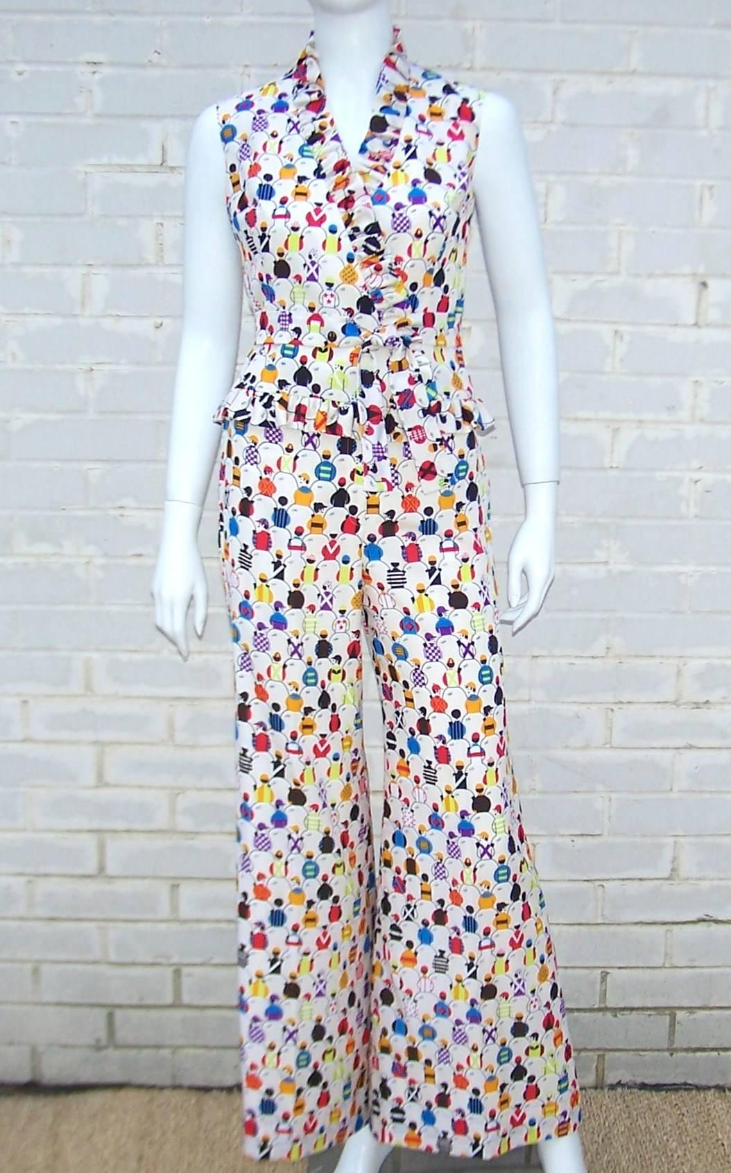 And they're off!  This 1970's silk ensemble by Papillon is a pop of color with an adorable jockey print to amuse.  The sleeveless wrap top snaps and belts with a stand-up ruffle collar.  The wide legged bell bottom pants hook and zip with a high