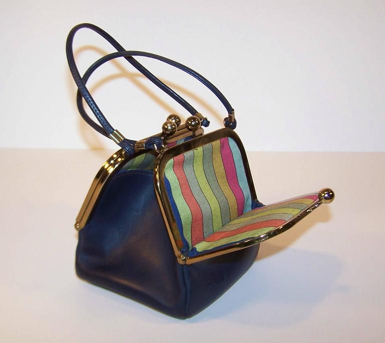 leather kiss lock handbag