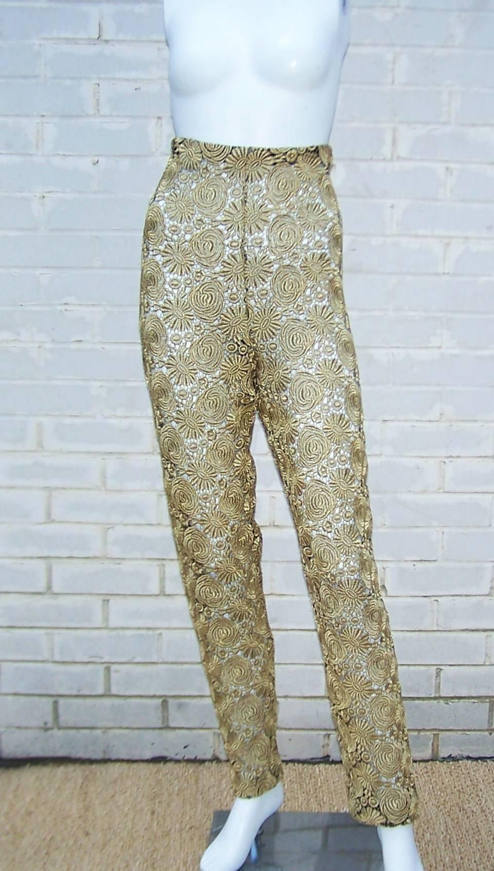 Fabulous!  There is a lovely antique quality to the gold lace fabric used by Spanish design team Victorio & Lucchino in these high waist cigarette pants.  Lace and historical references are hallmarks of V & L designs and these pants show some of