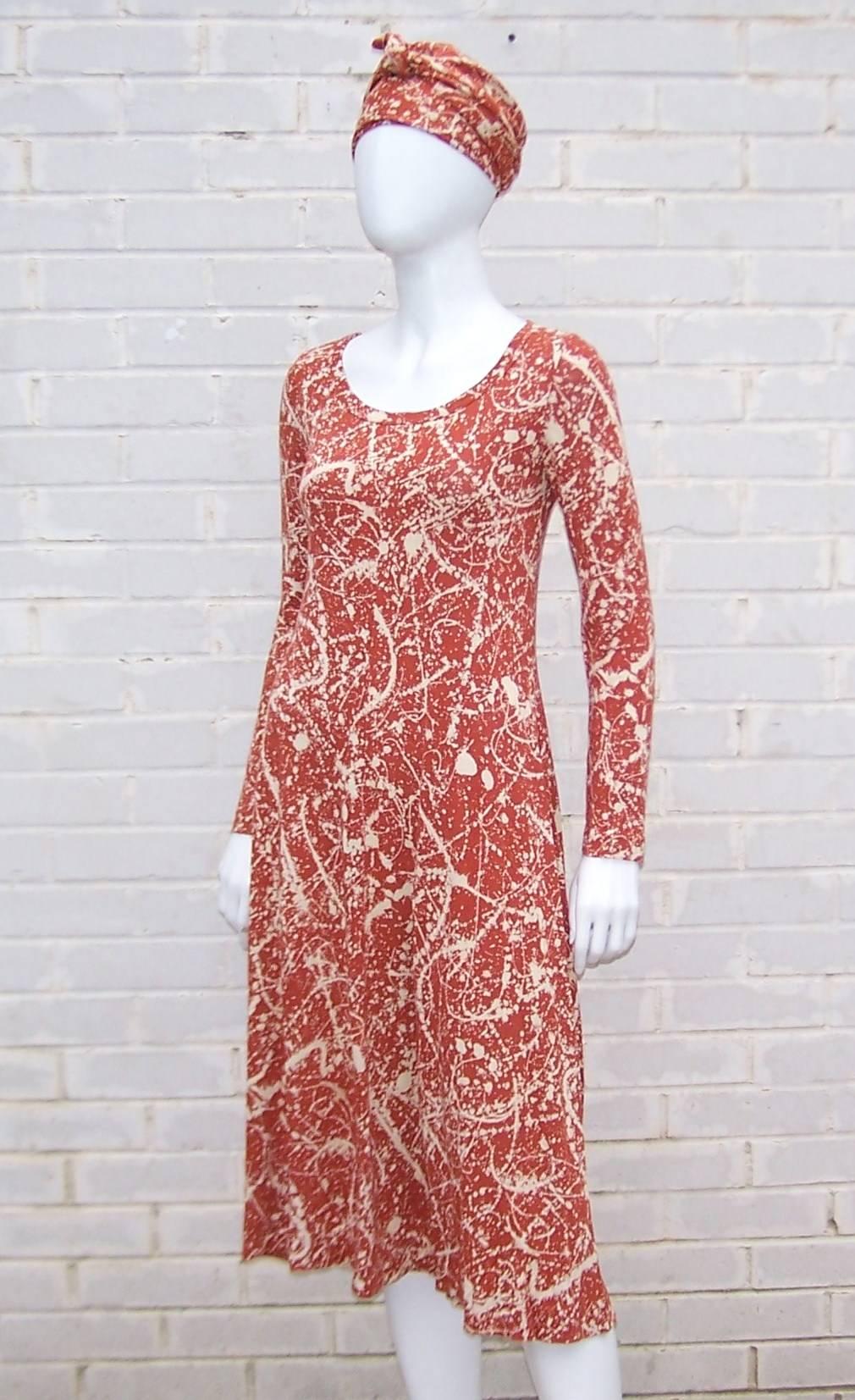 Perfect transitional weight dress to go from the summer to fall by the innovative 1970's designs of Diane Von Furstenberg.  The Jackson Pollock style splatter print is a rusty brown color with creme highlights all in a comfortable 100% acrylic