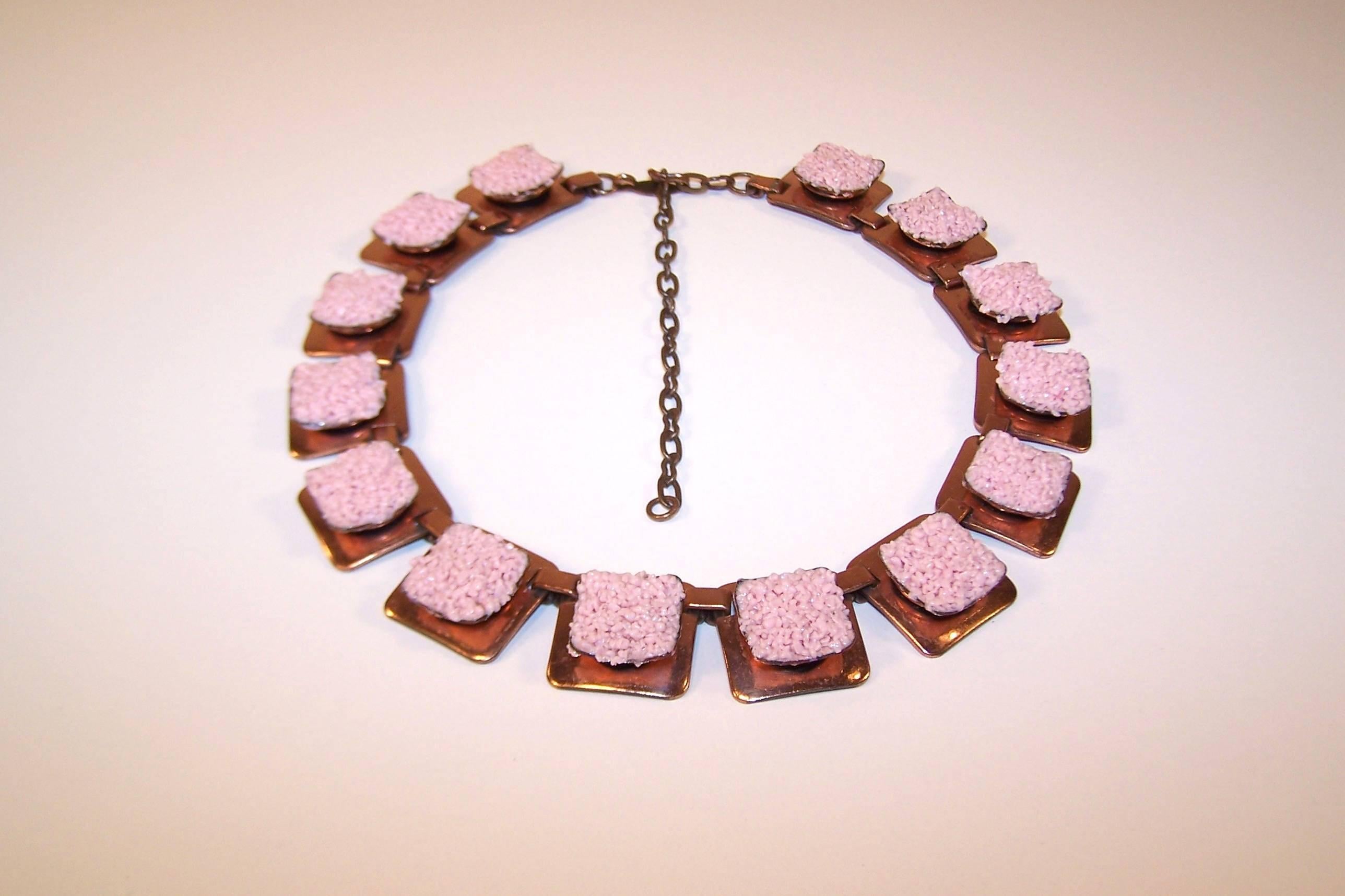 Visual texture abounds in this unique design by Matisse.  Each linked copper square is filled with pink enamel glass chips to create a beautiful mini mosaic.  The necklace measures 17