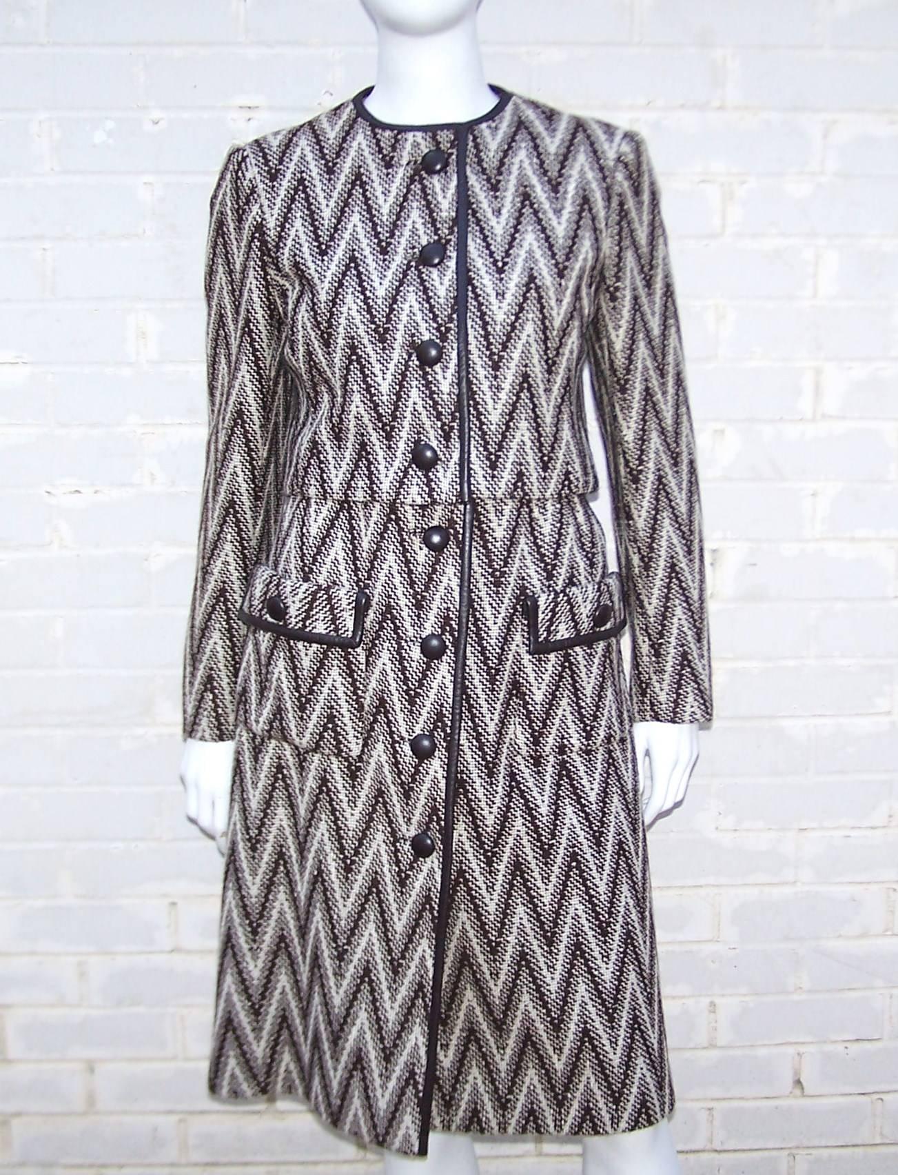 Gloria Sachs started her career as a textile designer creating fabrics for companies like Knoll and Herman Miller.  The dark brown chevron tweed fabric used in this two piece Chanel style suit is a great example of her textile design skills at work.