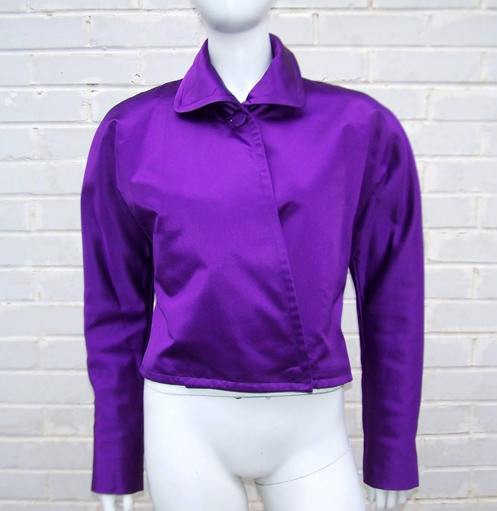 And she's off!  Coming down the stretch in her fabulous Ralph Lauren royal purple silk satin jockey style jacket!  It's a winner.  The jacket has a dolman sleeve construction with crossover buttons at the hem and fabric covered button at the collar.