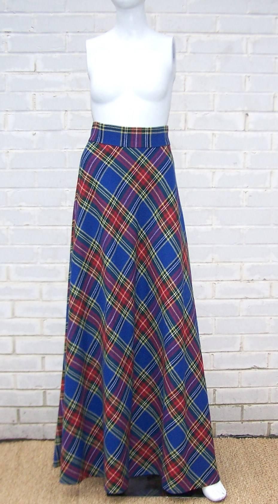 This maxi skirt is a long tall column of electric blue plaid goodness!  It is cut on the bias to accentuate your curves beautifully and create movement when you walk.  Red and yellow accents create additional vibrancy to the plaid.  The 2.5