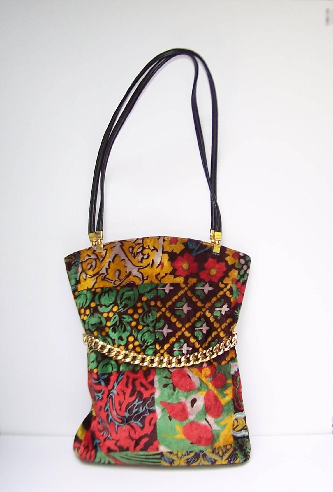 Mod...bohemian...whatever you call it...this handbag from Harry Rosenfeld has it!  The body of the 11.5