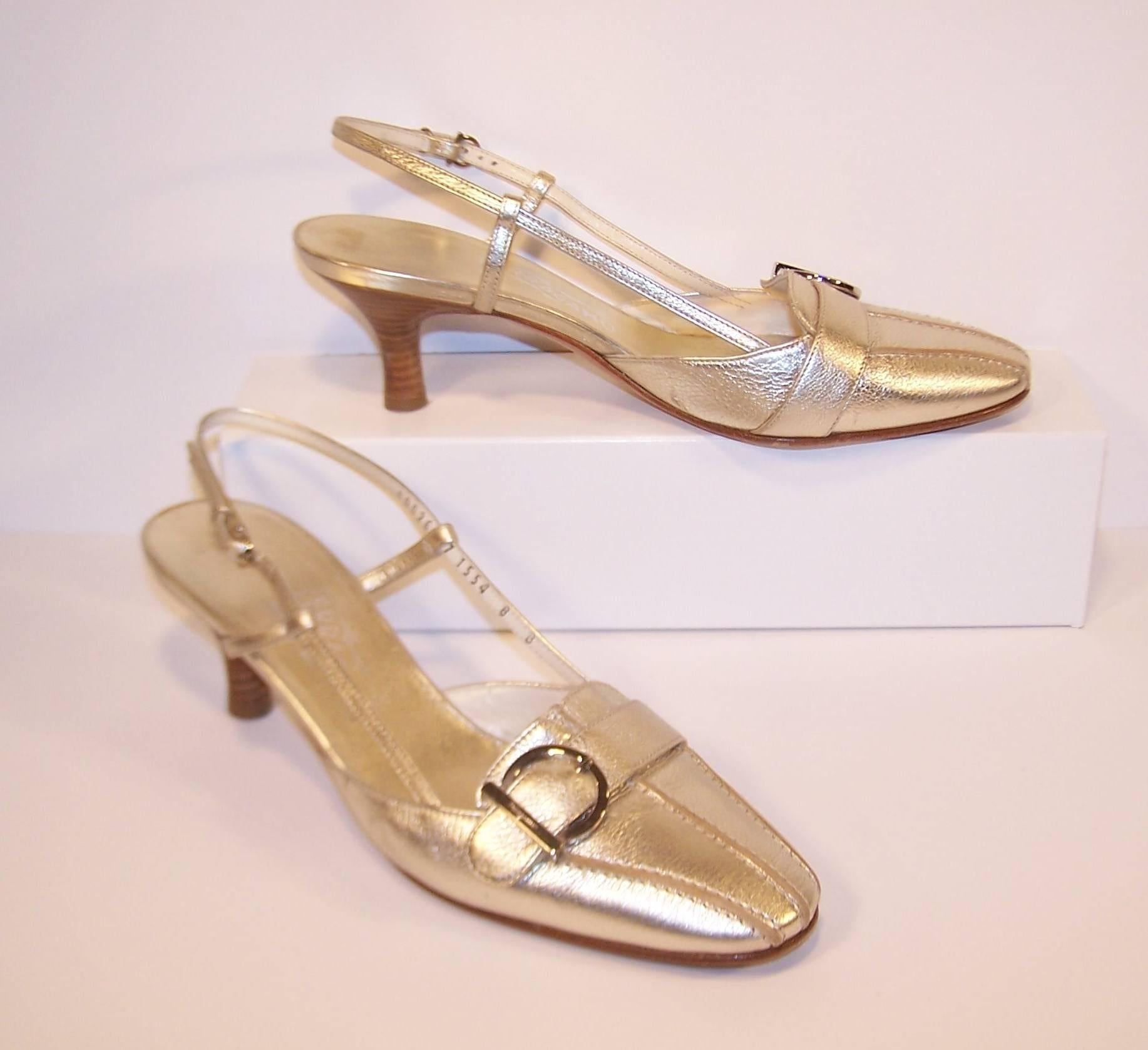 Love the versatility of these Ferragamo shoes!  The platinum leather works well as gold or silver shoes and the loafer style with stacked wooden heels can be worn as dressy or dressed down.  The adjustable slingback and 2.5