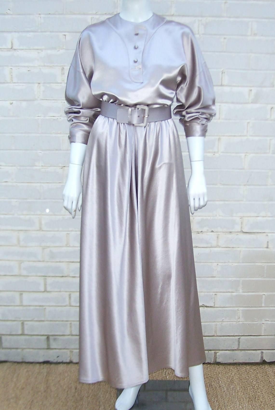 This Geoffrey Beene two piece ensemble is reminiscent of the sci fi films of the 1970's...Star Wars, Logan's Run...even Diane Keaton;s wardrobe in Sleepers.  The gorgeous platinum silver fabric feels like a wool blend with a disco era sheen for