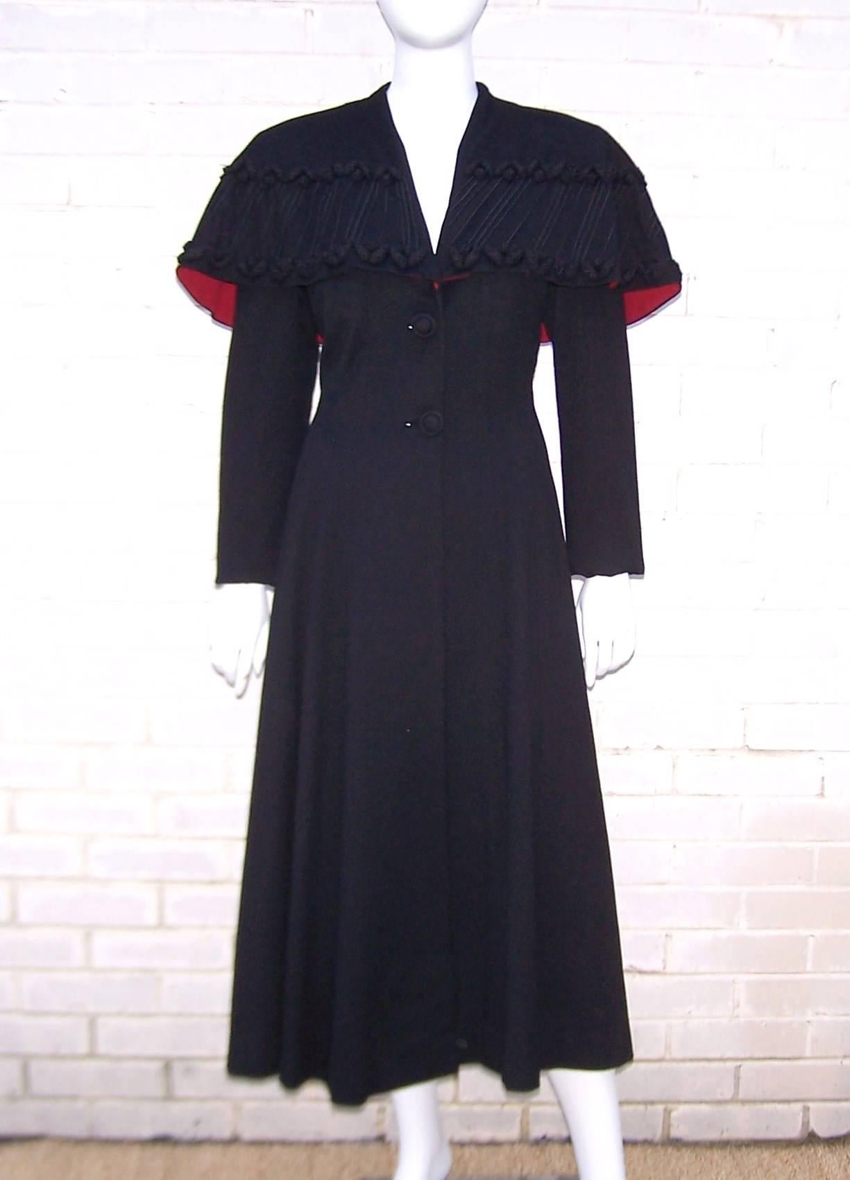 What a stunner!  Eisenberg is best known for producing high quality costume jewelry though they also created clothing until the 1950's.  This 1940's black wool coat has a classic princess coat silhouette with the addition of strong 1940's shoulders