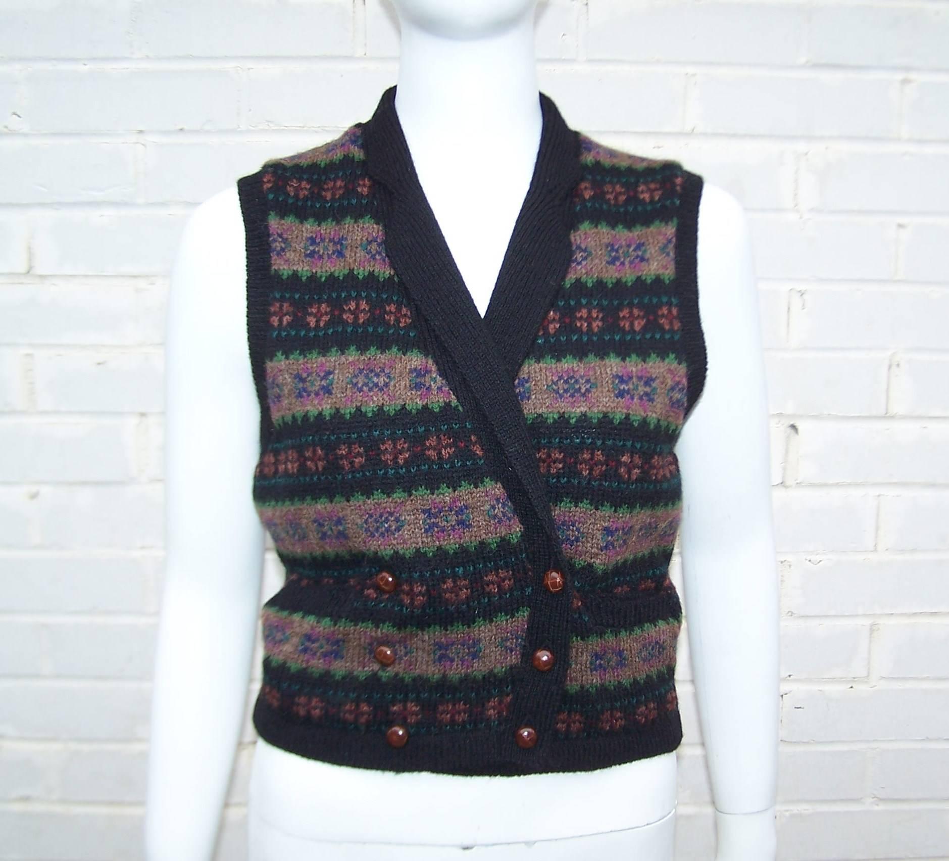 Add a charming finishing touch to your ensemble with this 1970's Ralph Lauren sweater vest designed with waistcoat styling.  Vests are always an interesting  touch and a great way to add a menswear influence to your look...not to mention a little