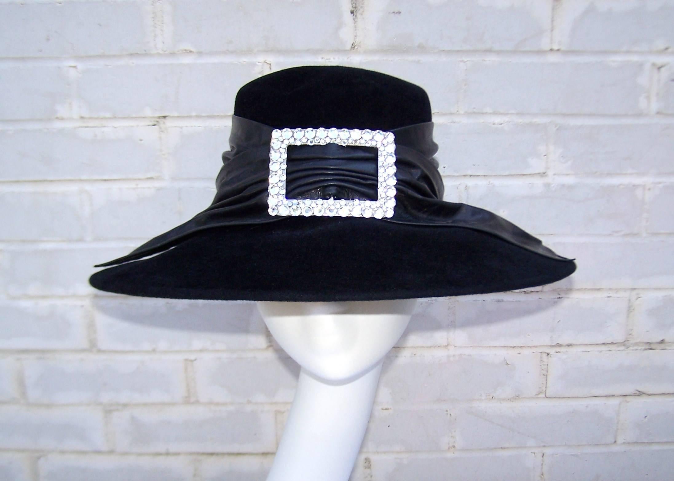 The pilgrims had their hats and now you can have yours!  With a few design updates, of course.  This Gabriel Amar design for Frank Olive is a black wool body with leather at the brim and a large rhinestone buckle.  The look is fierce and