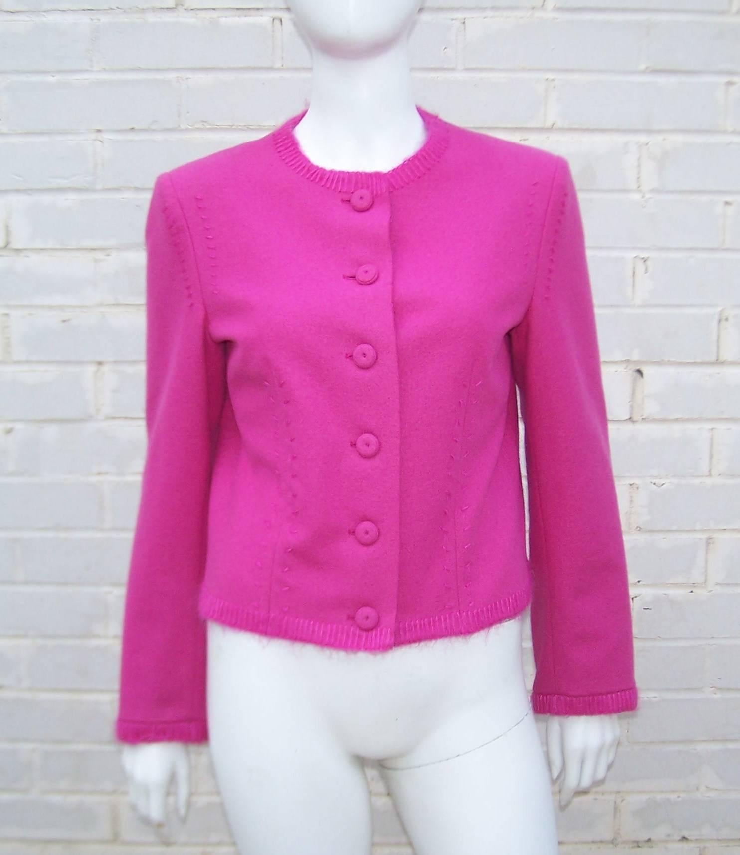This hot pink Moschino Cheap And Chic jacket is a simple design with fun details such as mohair yarn stitching, unfinished seams and fabric covered disc buttons.  Perfect for cooler weather and light weight enough to moonlight as a sweater.  Unlined