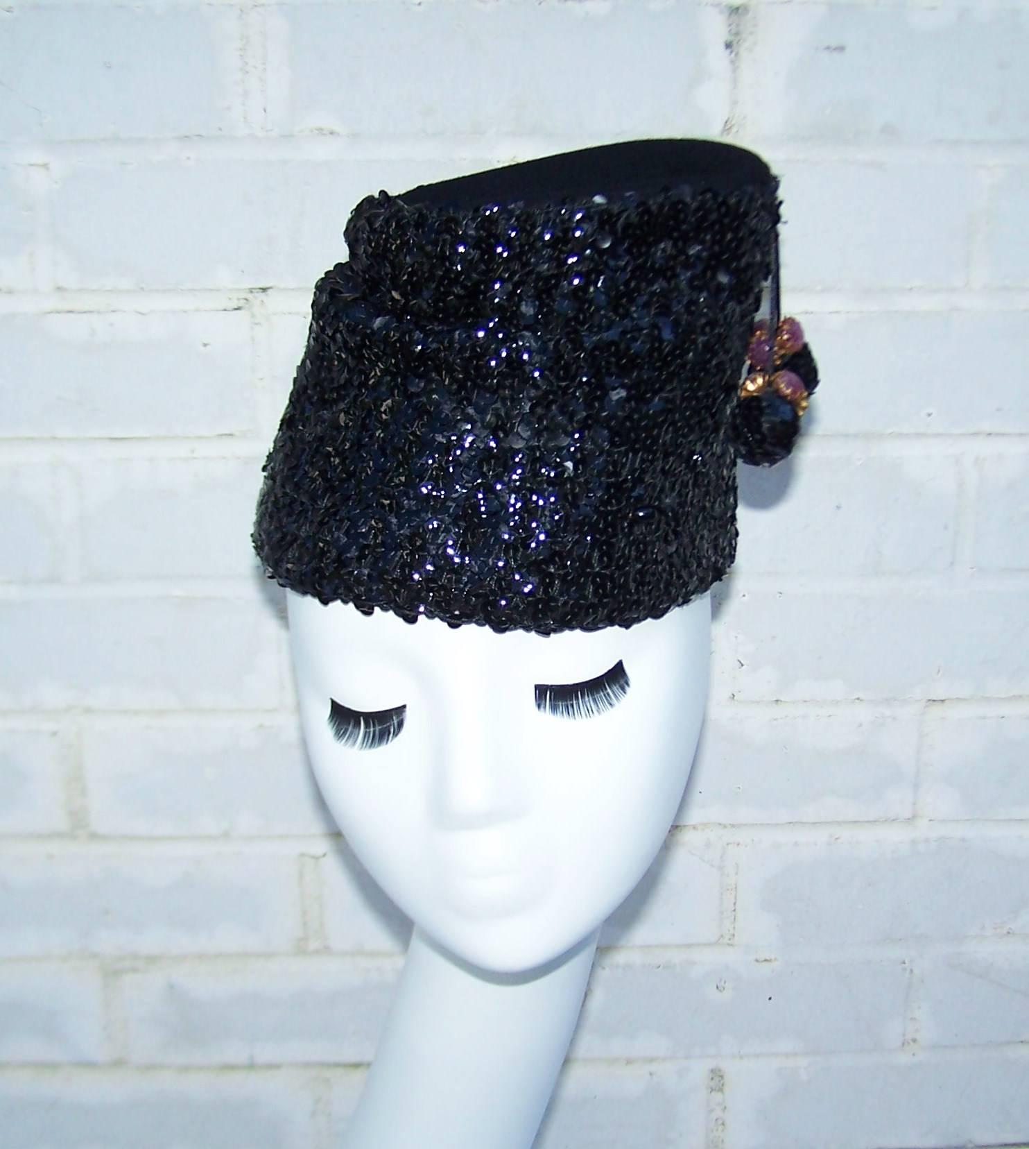 Love this glamorous topper by Henry Pollak!  Add this sequin turban style black wool hat to anything from evening wear to a daytime wool jacket for instant chic.  It begs to be worn slightly askew and is designed with a slouch for just the right