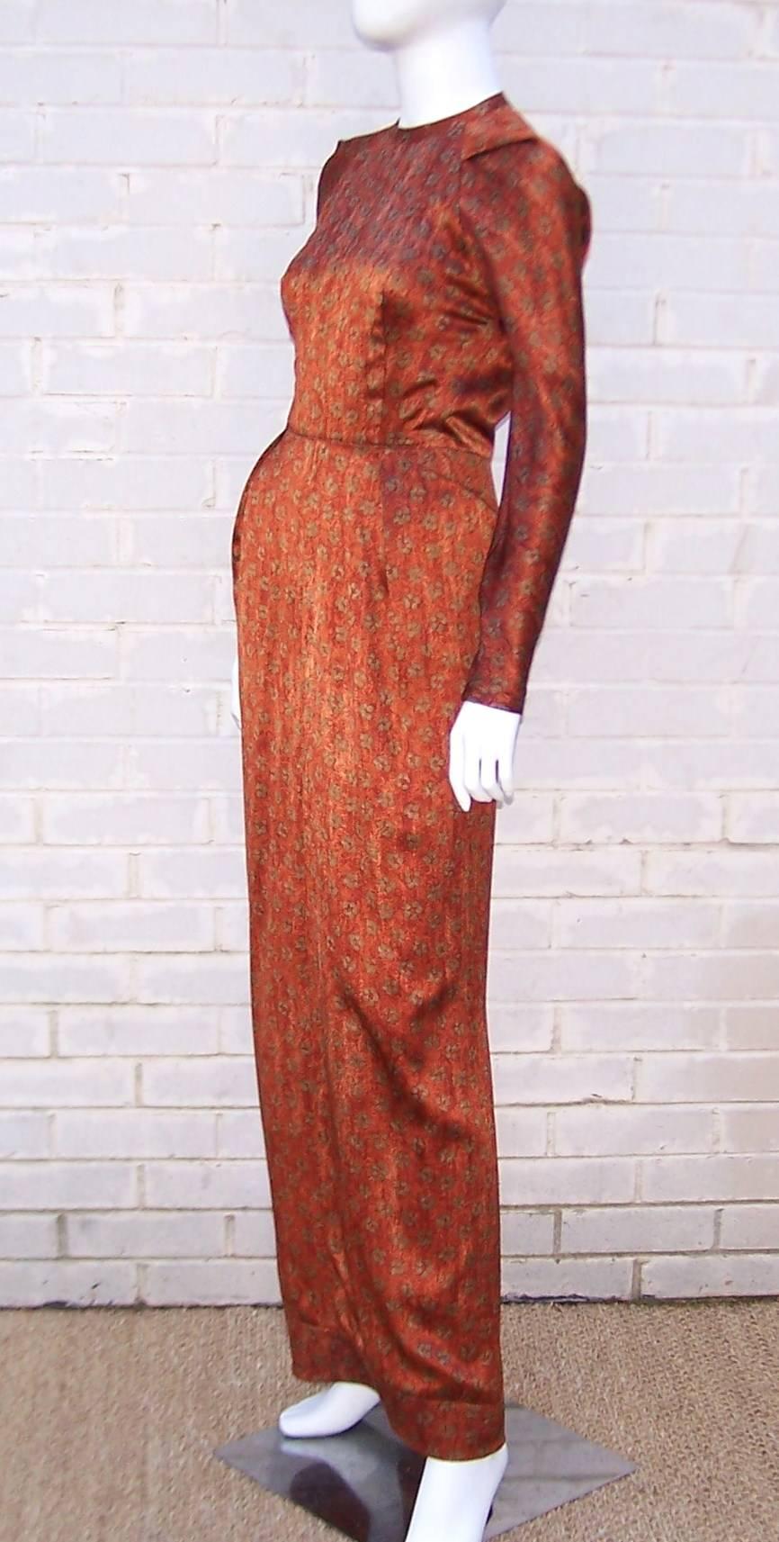 Now this dress is one tall drink of water!  Start with the gorgeous silk fabric in a coppery mottled brown with an abstract olive green floral print and continue with structural details from the shoulder to hem for an eyeful of elegance.  The dress