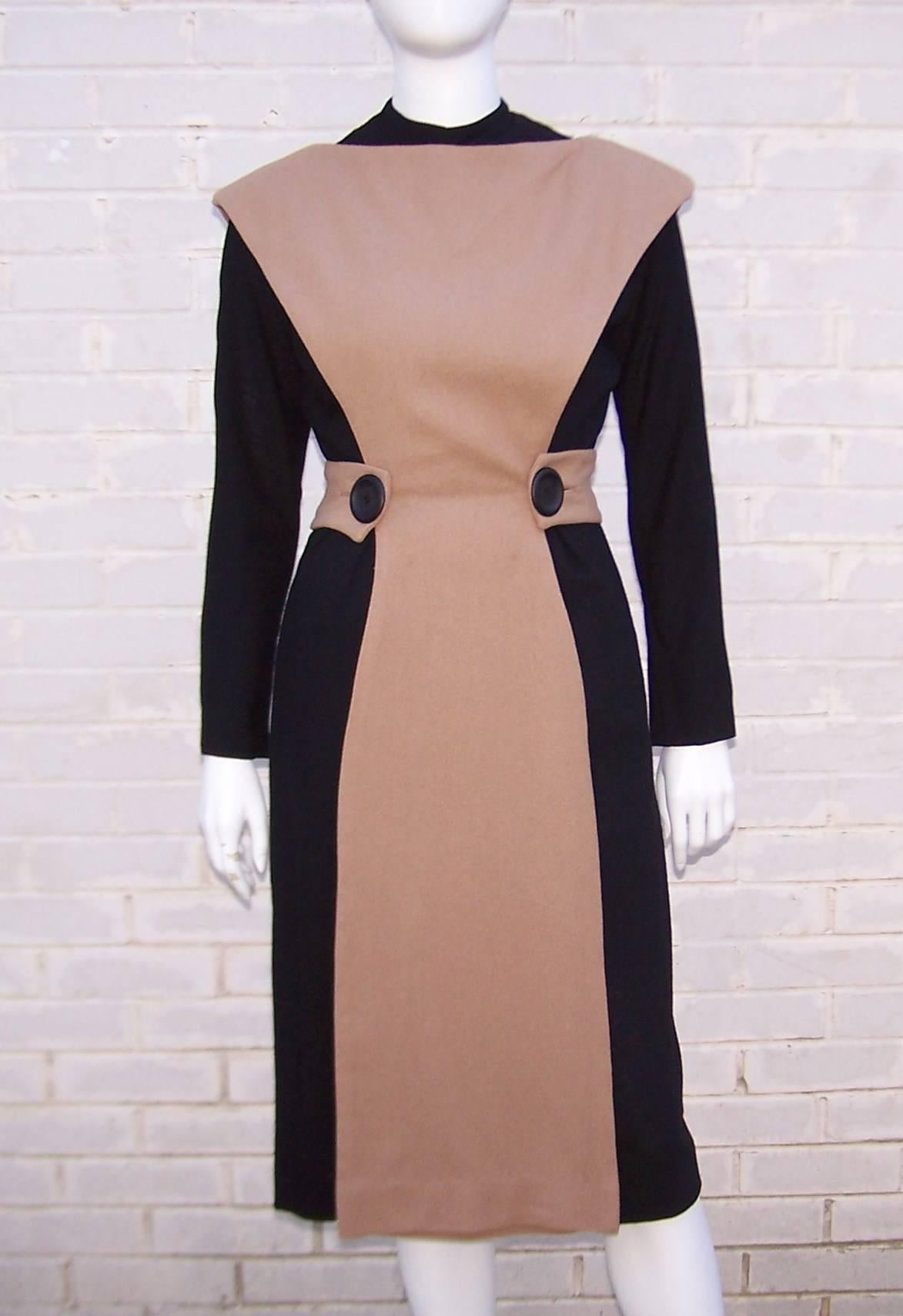 This 1950's dress conjures up images of Katherine Hepburn in The Desk Set...classic 1950's silhouette with a serious 'sexy secretary' vibe.  It is really two outfits in one starting with a black mock turtleneck wiggle dress which zips and hooks at