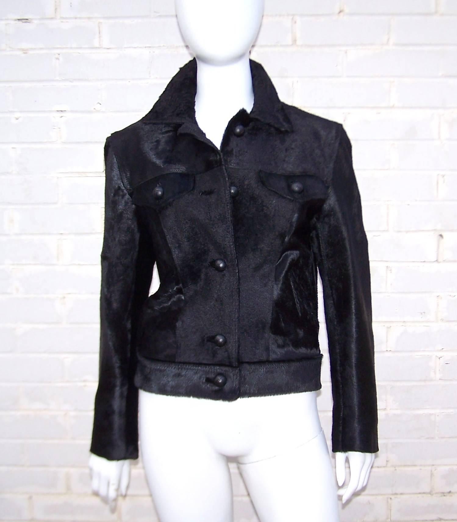 Be a cool kid in this Gianni Versace black pony hide jacket with all the old school style details of a denim jacket.  It buttons at the front with built in waistband, side pockets, button flap breast pockets and a collar that is just begging to be