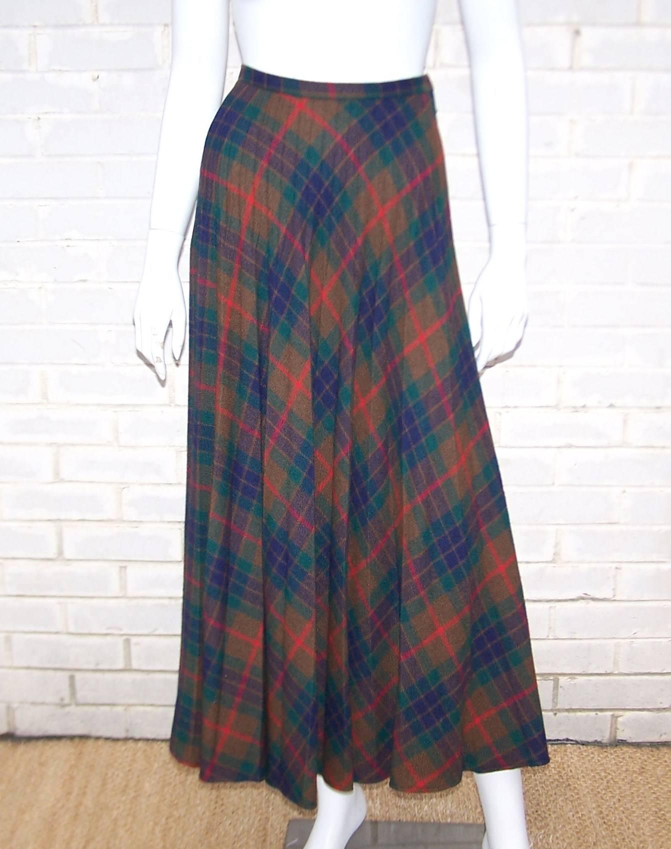 The micro pleating on this plaid wool skirt is a sartorial work of art. It is masterfully pleated to create volume and movement without bulk at the waistband and hips.  The clever design creates a great deal of movement when you walk...all the more