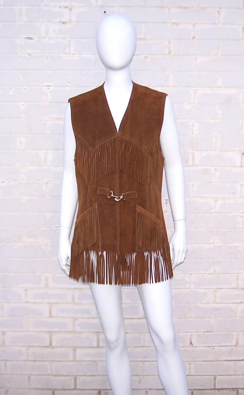She's a little bit country OR she's a little bit rock 'n' roll ... this vintage 1970's Saks Fifth Avenue caramel suede vest can be boho or full on cowgirl depending on your accessories and personal style.  The attention to details including the