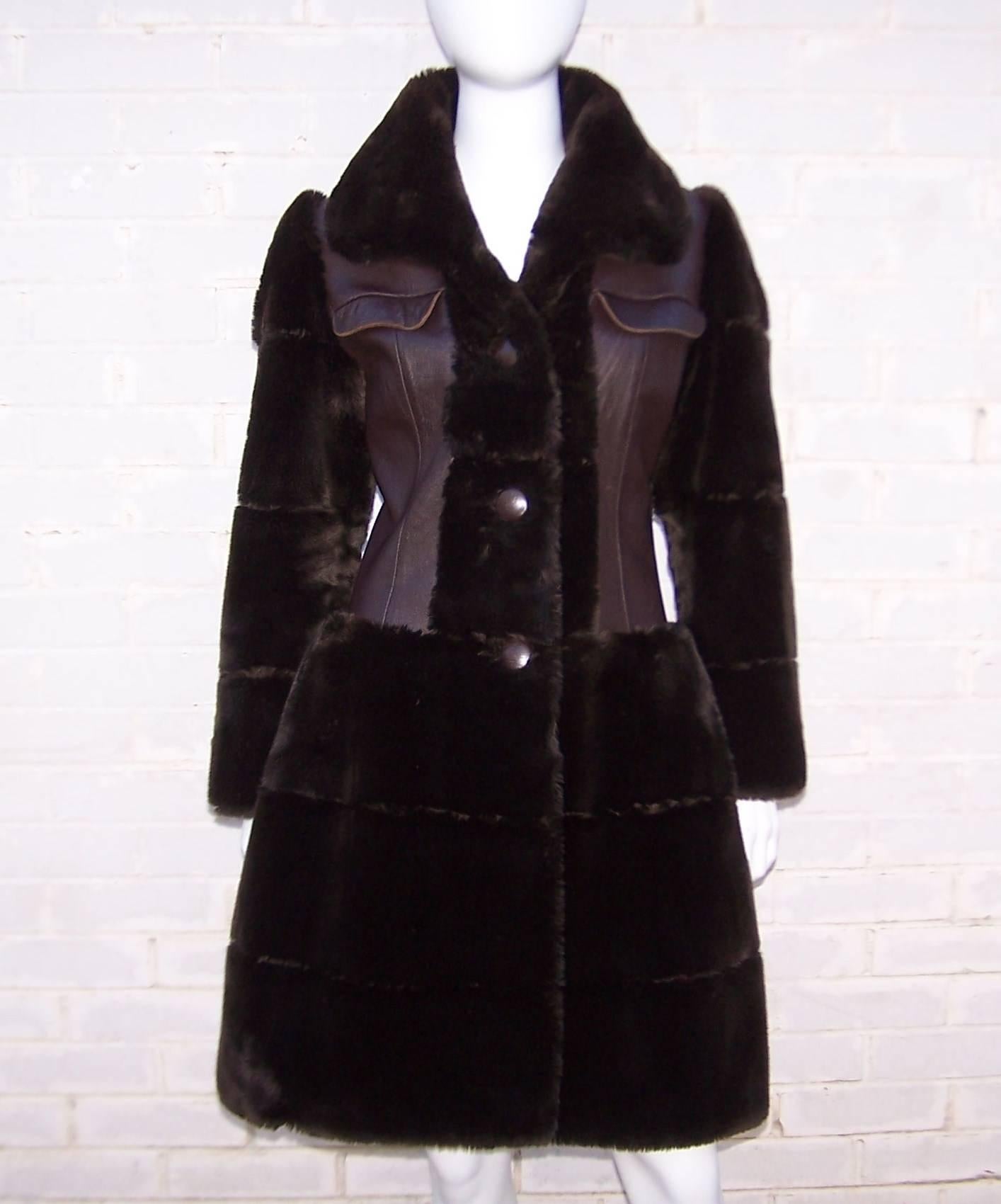 This stylish 1960's French design by J. P. Weinberger is reminiscent of an 1930's flight jacket a la Amelia Earhart.  A little bit of steampunk and a whole lotta mod!  The high quality dark brown faux fur body is accented with a coordinating leather