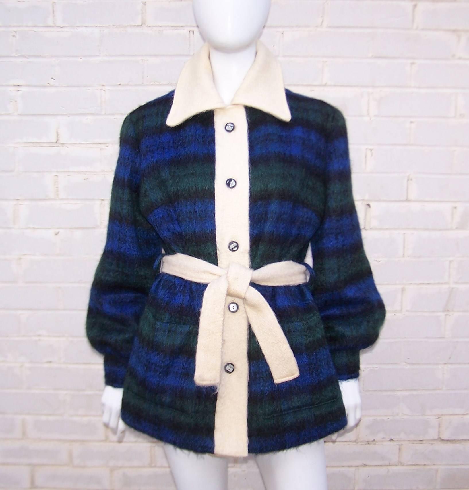 You can't go wrong with a classic Scottish plaid especially when it is a versatile jacket in a cozy mohair.  This comfy jacket by Fraser Cameron buttons at the front with a blue, green and black plaid combination offset by winter white trim and