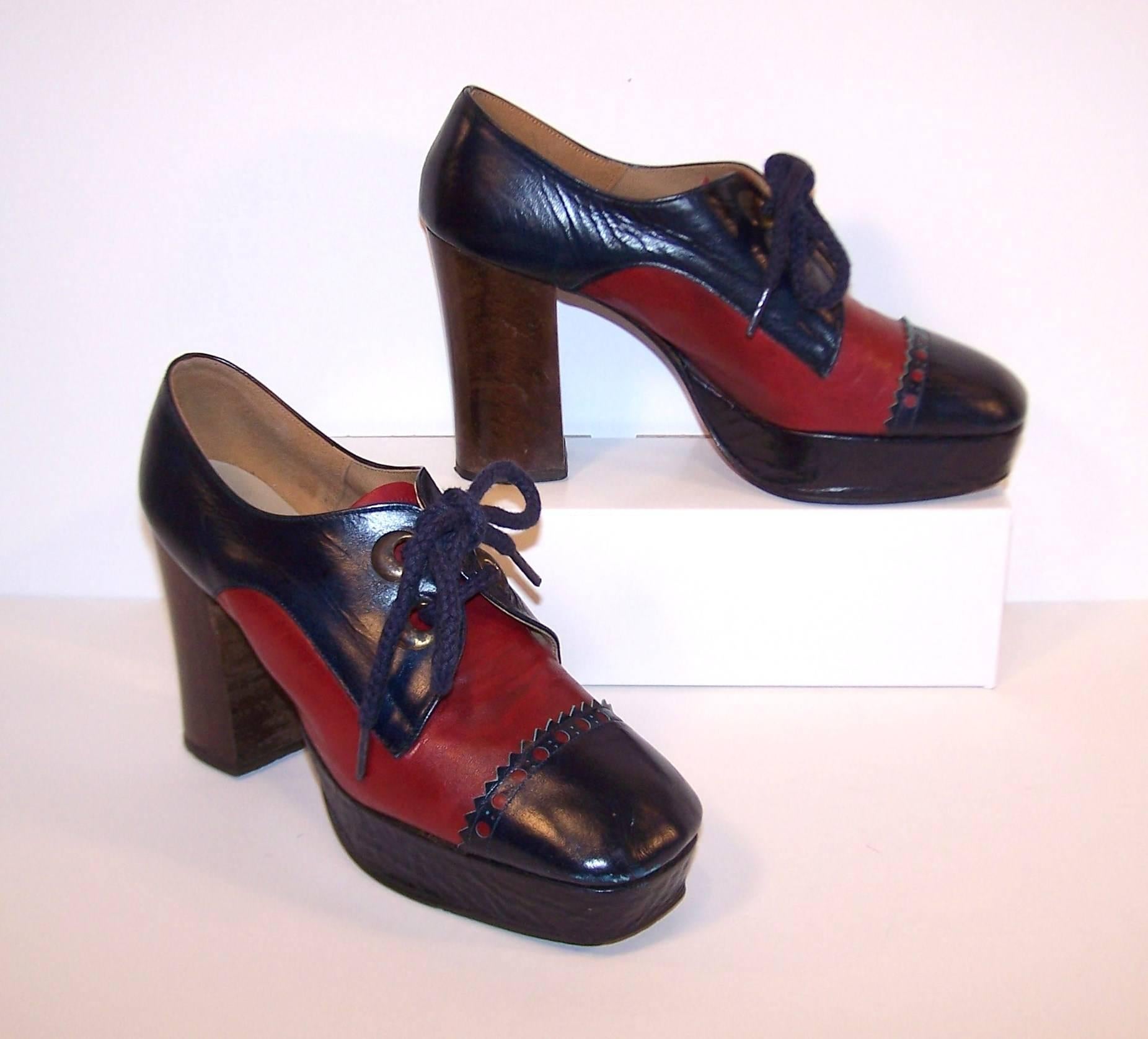 These Nina full leather oxford shoes combine both the fabulous platform look of the 1970's with the old school spectator style of the 1930's.  The two tone color combination of a dark cherry red and navy blue leather are offset by a 4" tall