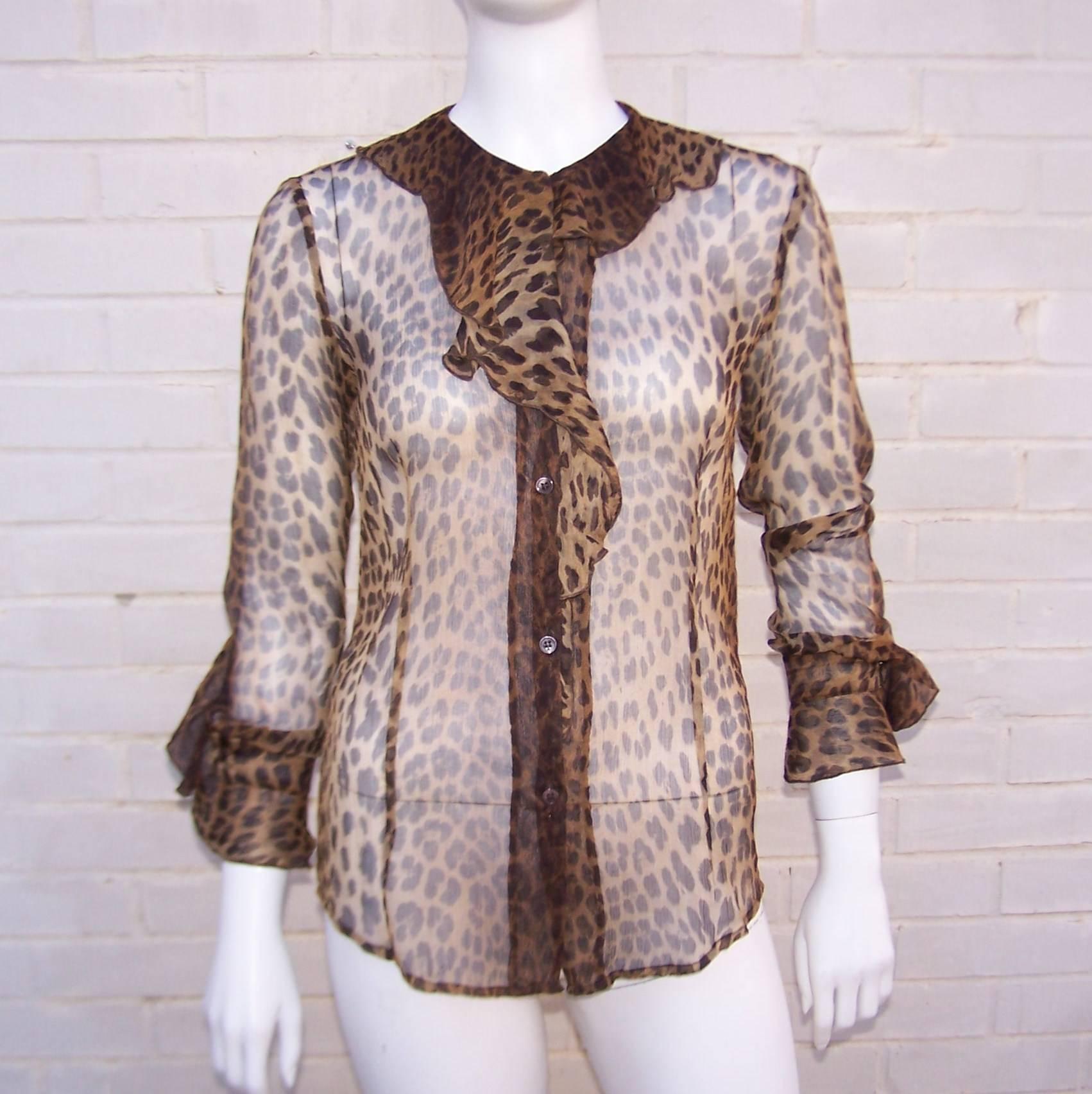Purrrrrfect sheer leopard print top from the 'Love Moschino' jeans label.  It has an ultra feminine vibe with a flounce collar and cuffs though it is cut like a menswear shirt with front and back tails.  It buttons up the front with a jabot neckline