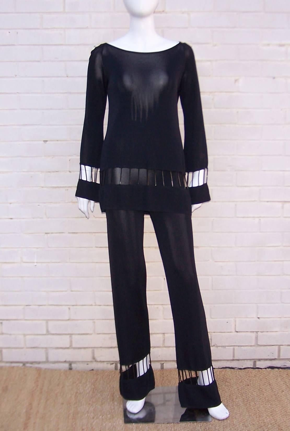There are so many things to love about this Thierry Mugler two piece ensemble.  The unique design is modern and contemporary but with a nod to the mod designs of the 1960's.  The slinky black jersey fabric is embellished with 2.25