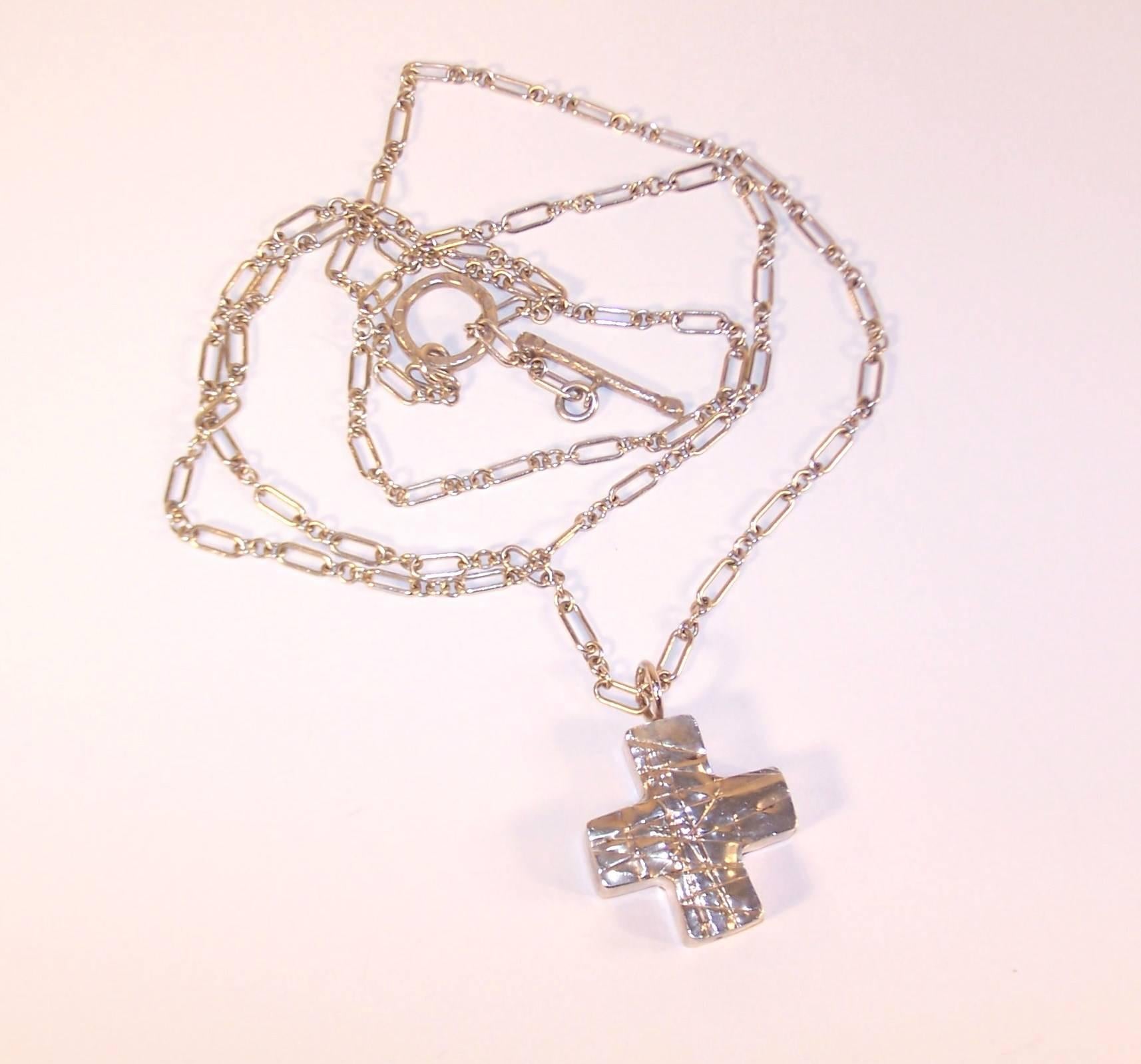 Add a little 1980's goth to your look with this artisan crafted sterling silver necklace by Margaret Ellis.  The modernist design is actually timeless and can add a sophisticated look to an all black ensemble or a punk edge to your favorite leather