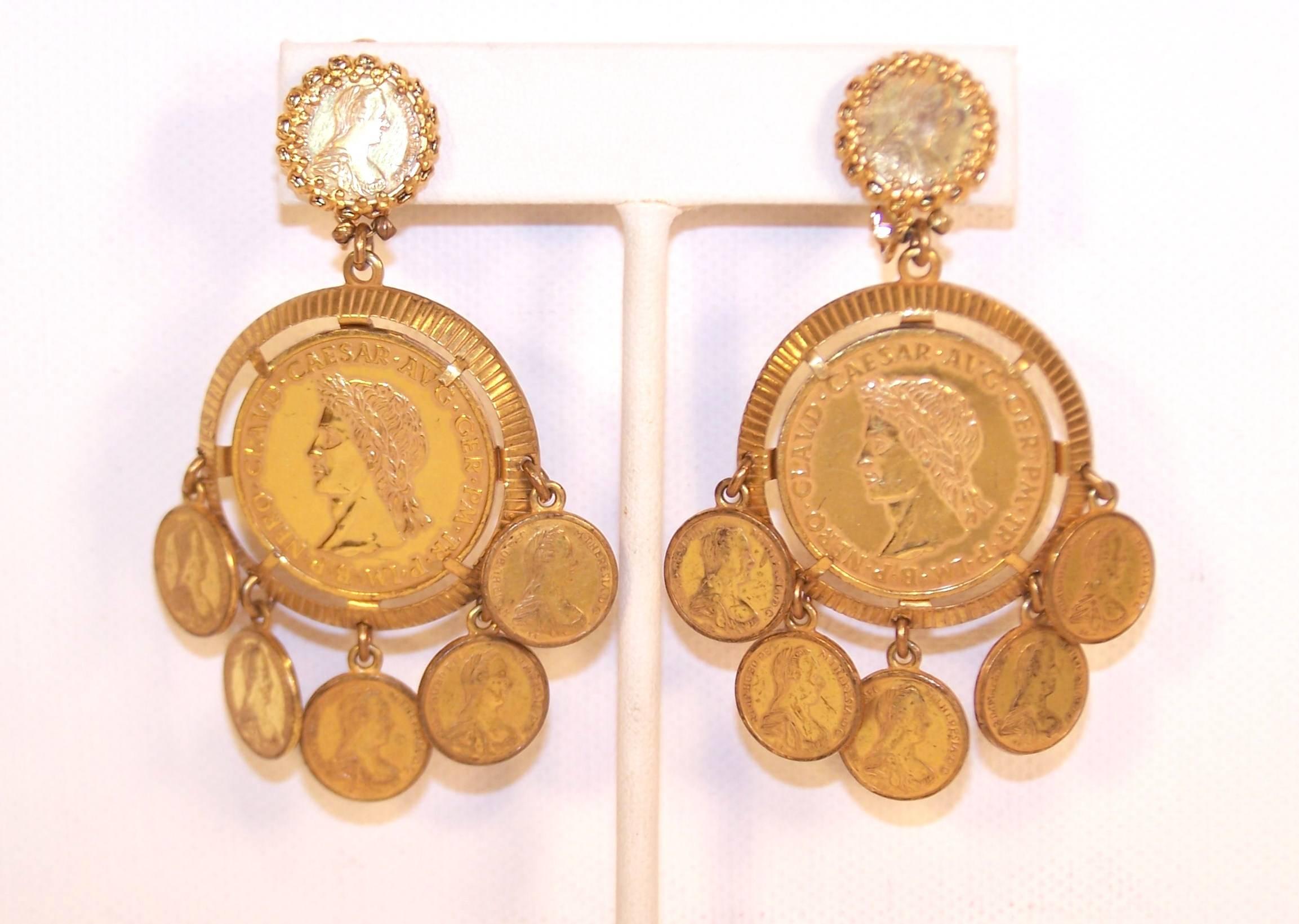 Oh the allure of coin jewelry!  From classic Chanel belts to the exotic style of Mughal crown jewels...coins have been used for fashionable decoration for centuries.  These 1960's earrings from Miriam Haskell are loaded with quality details that