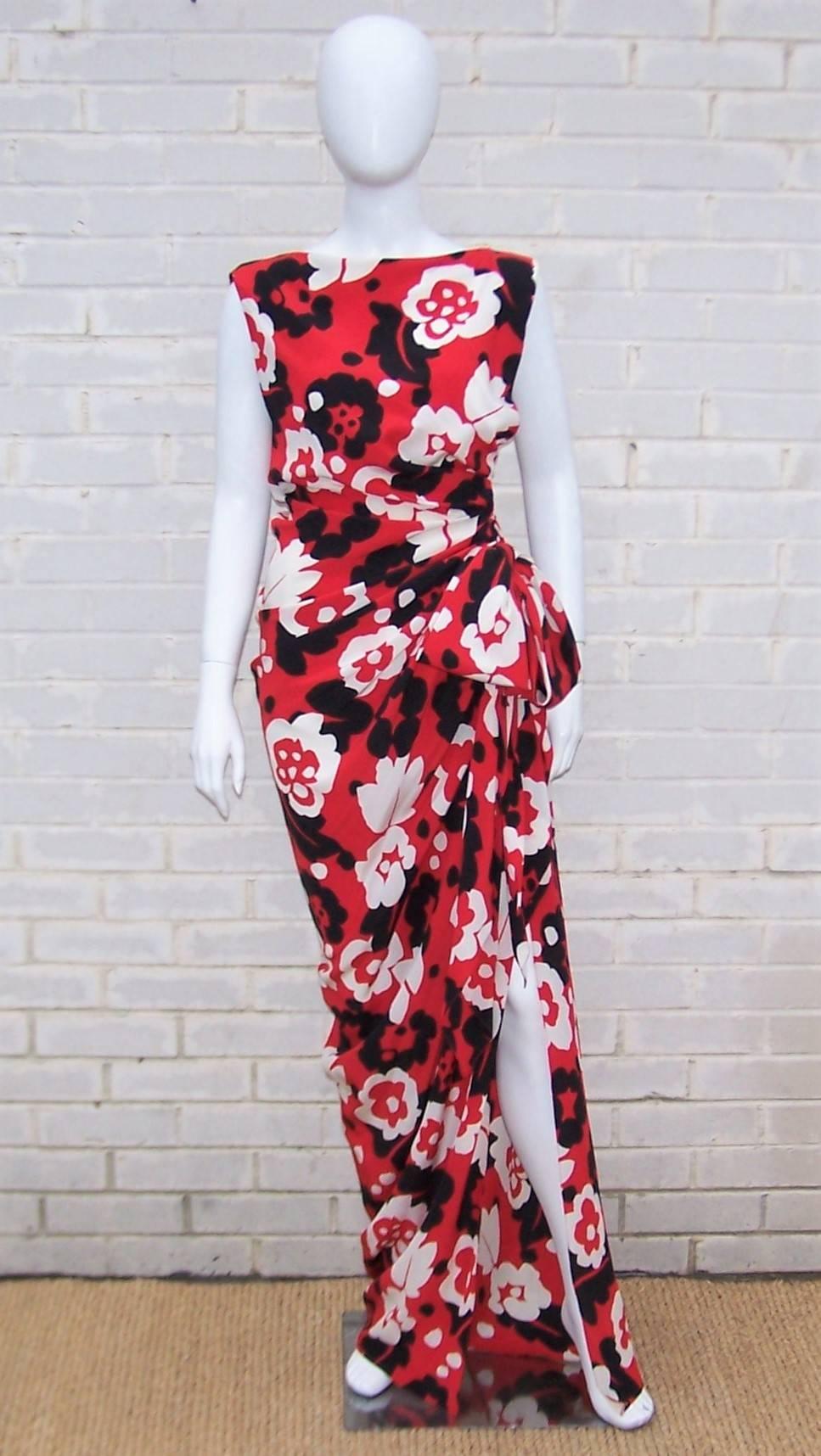 Adorn yourself with this exotic goddess silhouette by the master of feminine design, Oscar de la Renta.  The black, red and white floral silk conjures up images of tropical locales and the relaxed, yet glamorous, construction is perfect for evening