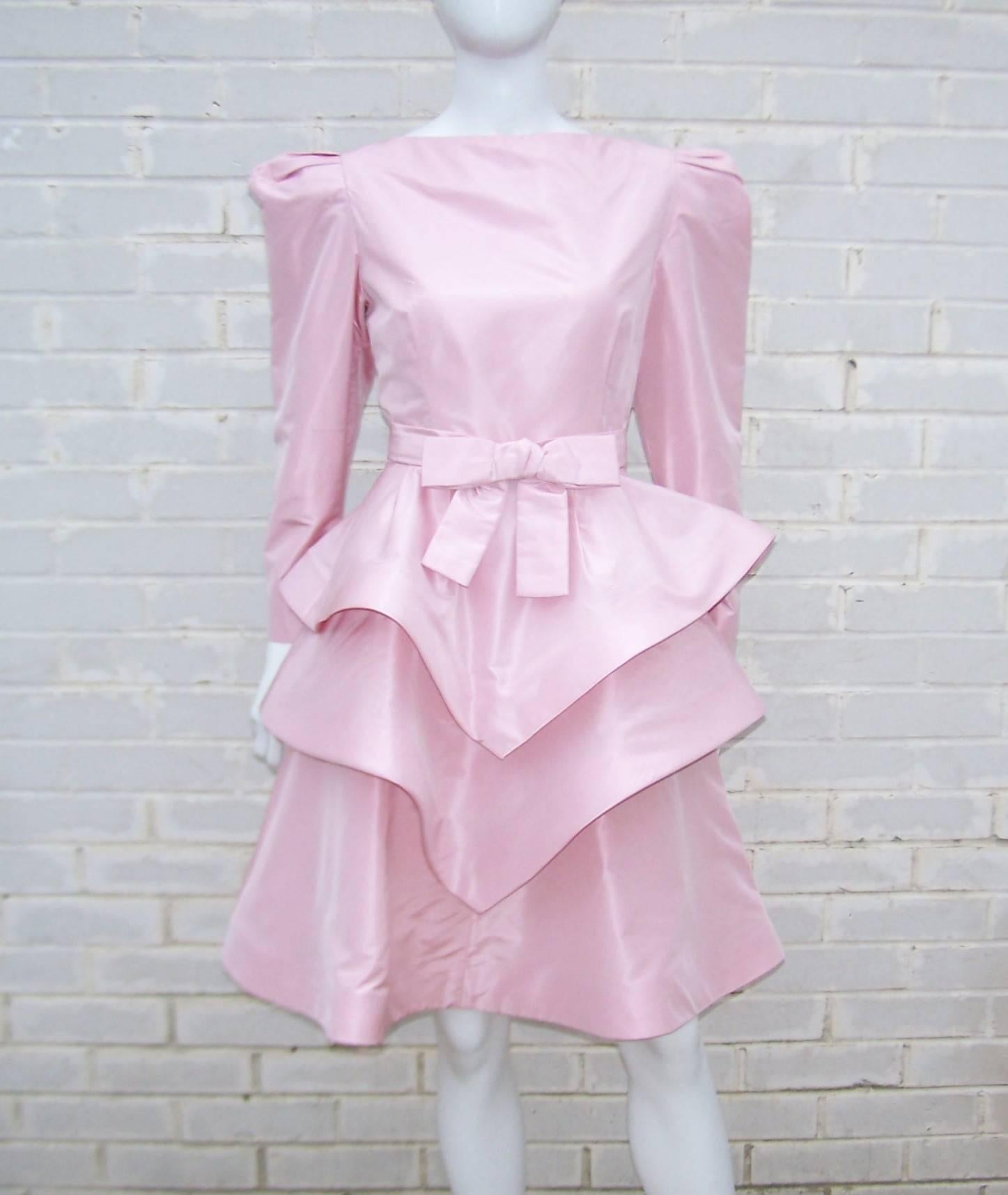 Cotton candy confection!  This Scaasi Boutique party dress is all kinds of sweet with a good dose of youthful sass.  The powder pink silk taffeta is fitted in the bodice with a boat neck and zipper with hook at the back.  The three tiered skirt
