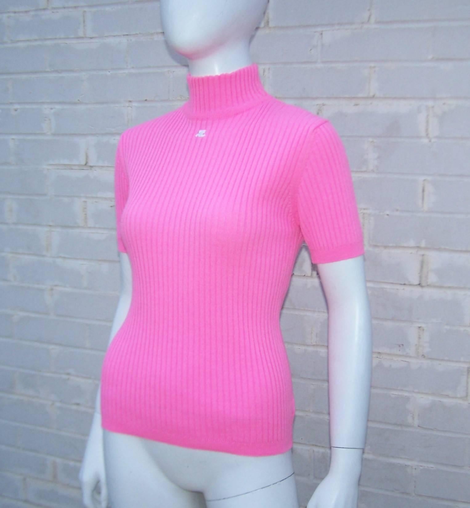 bright pink turtleneck sweater