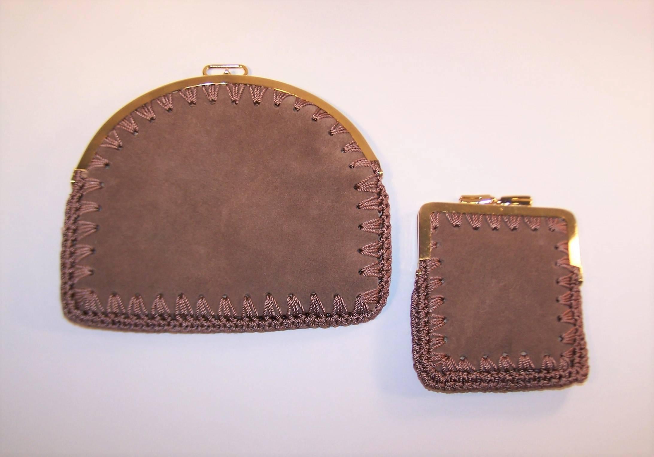 Get out your butterfly net and catch these adorable nesting small suede purses made for Neiman Marcus.  The larger clutch can be used as a small purse or is also suitable for a traveling jewelry case or make up bag.  The smaller bag is perfect as a