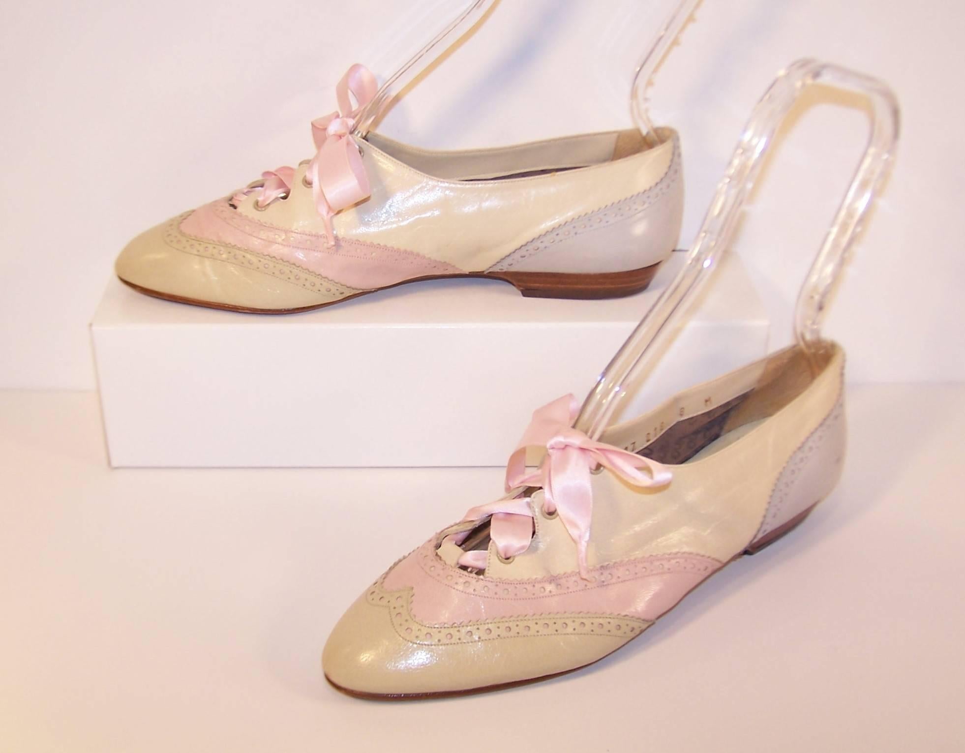 Cheers for the feminine wingtip!  This Nina design from the 1980's combines a menswear style wingtip with an array of pastel colors including creme, ballerina pink, tan and dove gray.  The pointy toe construction fits right in with current trends