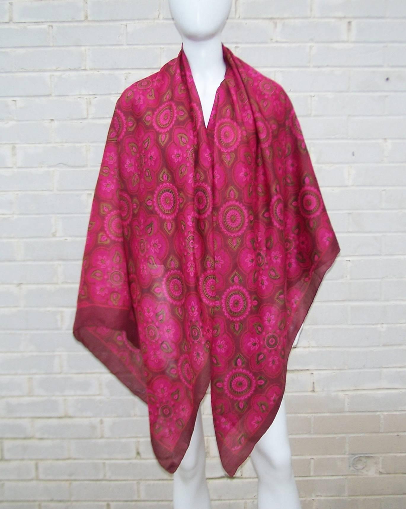 Bold, bright and beautiful!  Just many of the ways to describe this 1970's Pierre Cardin handmade Indian silk scarf.  The large 71.5" x 43.5" rectangular wrap has an exotic benjarong style design incorporating shades of hot pink and green.