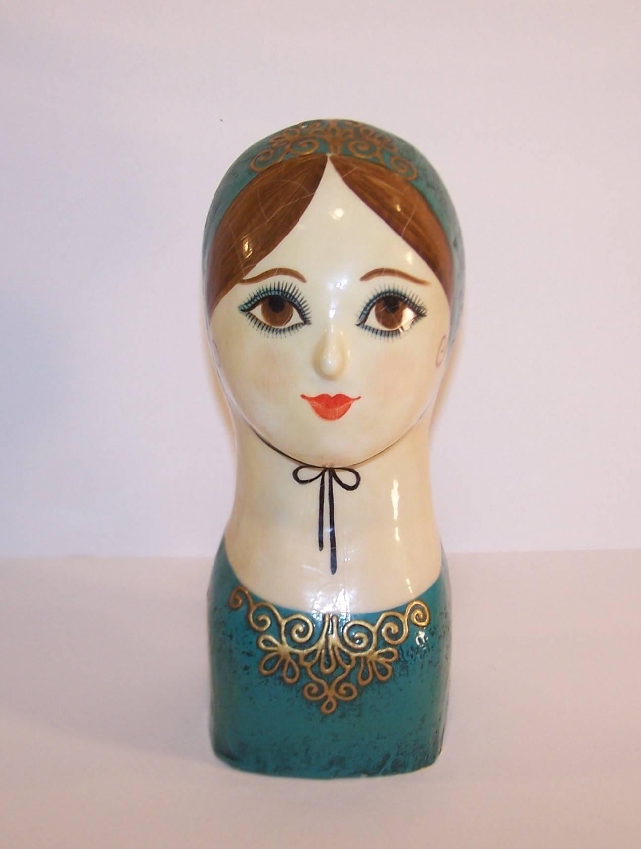 The Italian papier mache artist Gemma Taccogna had quite an impact on the fashion world of 1950's New York including custom designs for Mr. John's widely successful millinery boutique and creations for store windows at Saks Fifth Avenue, Lord &