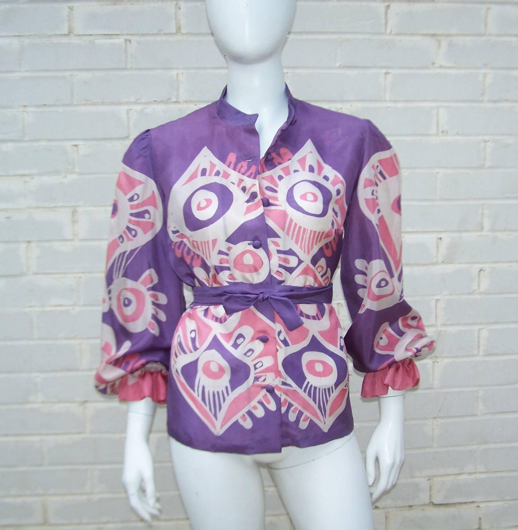 What a great combination of an artisan print and a mod design!  This hand printed silk blouse is reminiscent of Pucci styles from the same era.  The exotic psychedelic print is perfectly offset by the pink, purple and white colors all wrapped up in