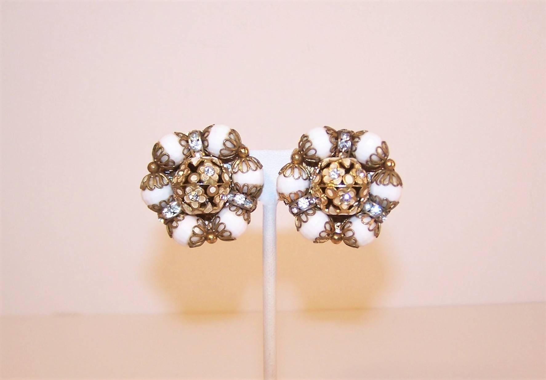 Call these good old fashioned ear bobs!  Hobe, a favorite of costume designers on the stage and screen, utilized fine jewelry techniques to create affordable accessories from non precious materials.  These clip on earrings are loaded with quality