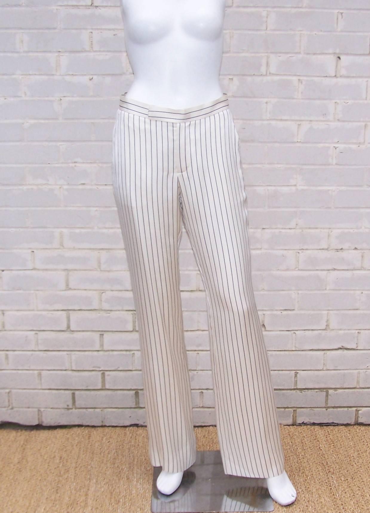 Take on a stylish gangster look with these c.1990 Ralph Lauren androgynous blue and white pinstriped silk pants.  The classic flat front menswear style features a relaxed waistband with zip front, tab closure and side pockets.  They are fully lined