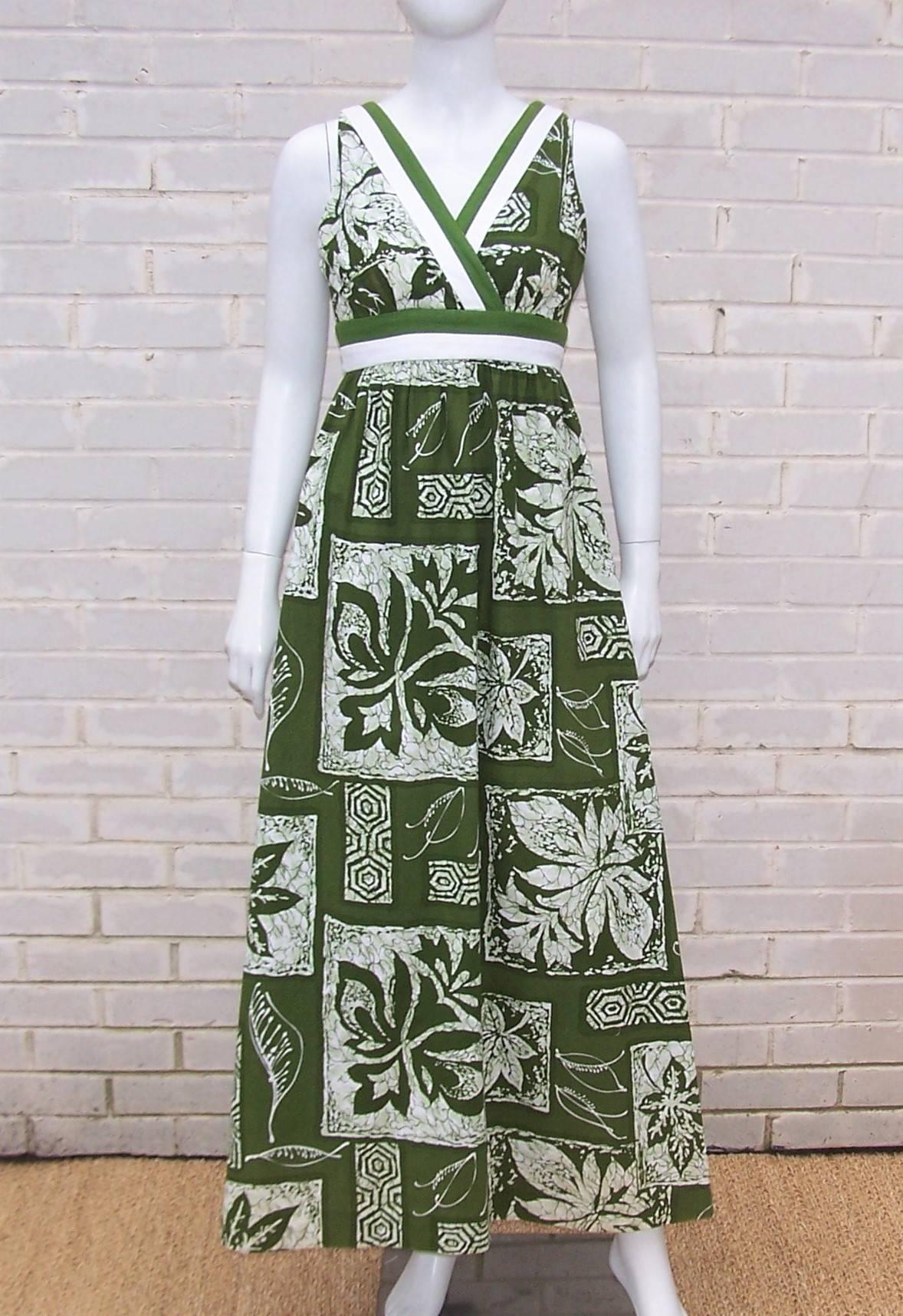 This fun maxi length sundress has quite a Hawaiian pedigree including two labels from both Penelope and Liberty House both famous Hawaiian retailers and manufacturers of quality apparel with an island flair.  The easy style and tropical fabric are