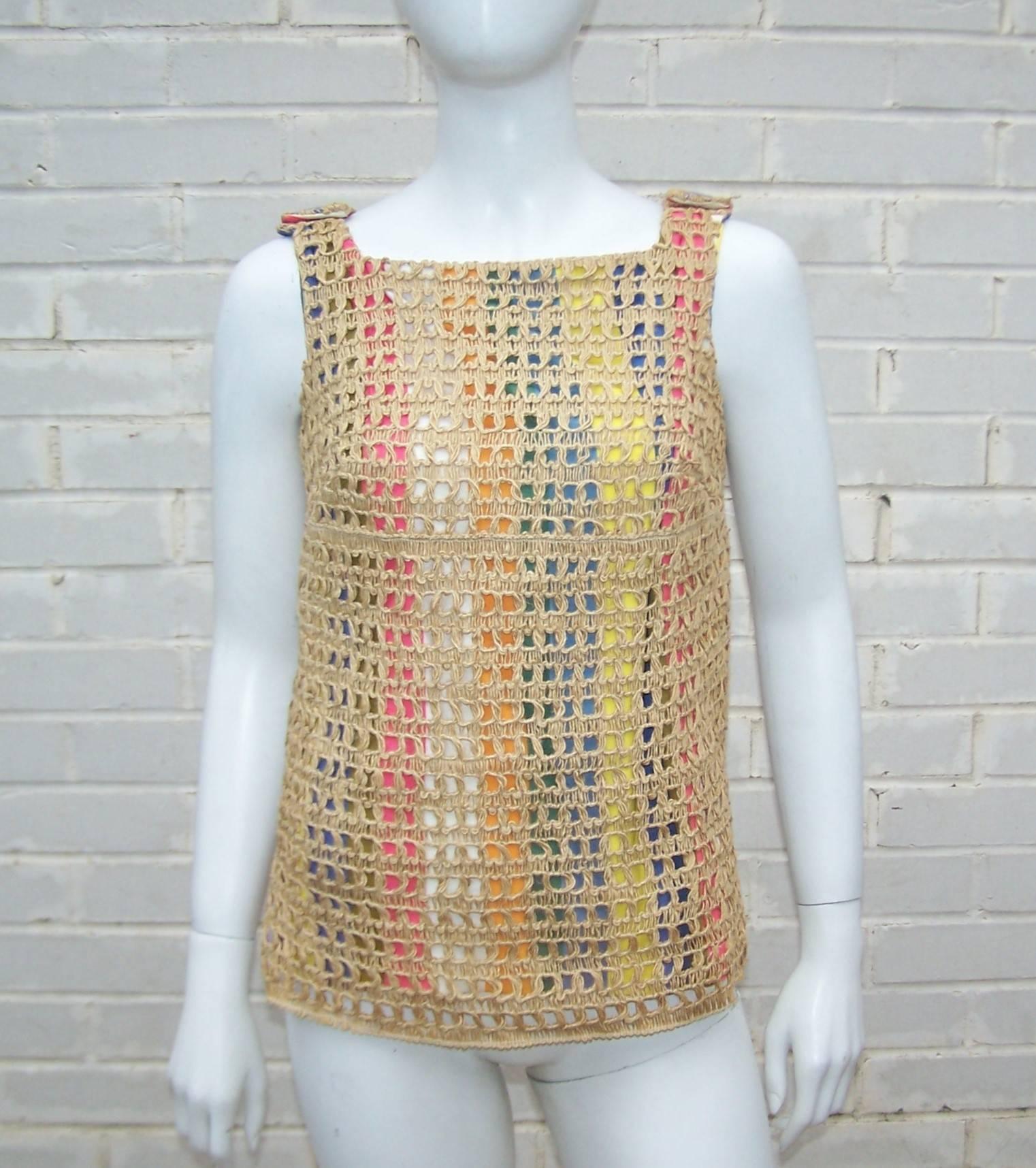 This little 1960's Stracci design should be vacationing on the Italian Riviera.  The simple pullover sleeveless top created by layering colorful striped cotton canvas with a raffia twine overlay looks anything but simple.  Yet the effortless style